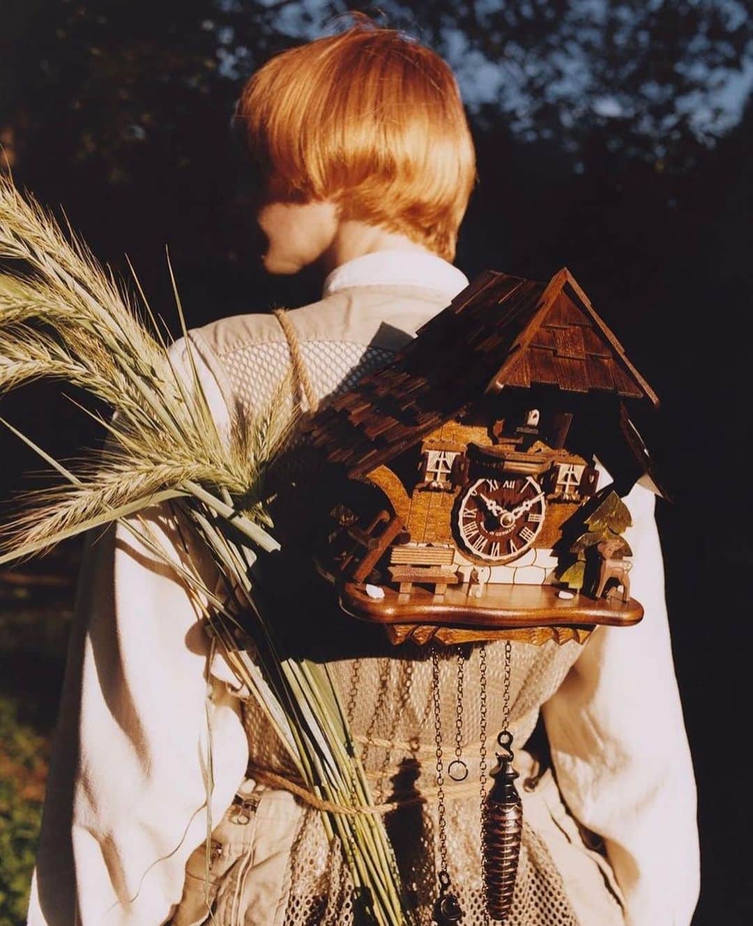 小藪奈央のインスタグラム：「. Last but not least 🐿️🕰 My fav look! リサーチして見つけたドイツの鳩時計屋さんに撮影の朝にピックアップしてもらい、 @shokupan.inc のアイディアで時計をバックパックに。genius 🐥  . PUMA x German Black Forest  ドイツのfolkloreと日本のアウトドアカルチャーをコンセプトに撮影しました。  Art Direction & Production: @shokupan.inc  Production Coordinators: @bianco_bianco_tokyo @joey.g123 @cauliflower.zip  Photographer: @adipvtra  Photo Assist: @kotaroymt Stylist: @nao_now  Stylist Assist: @akanetoile10  Props: @yuuu_rinchiii_  HMU: @feebz_   Talent: @meganotnes @okeydenchick  Special thanks @daredemonai.yamada」
