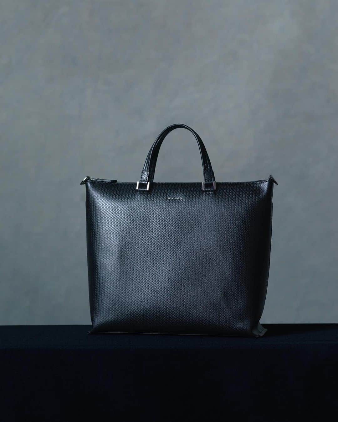 タケオ キクチのインスタグラム：「【NEW ARRIVAL Dress Bag & Shoes】 ⁡ ・Herringbone Leather Tote Bag  No.070-07324  ¥51,700(tax in) ⁡ ・Leather 2Way Clutch Bag  No.070-07352  ¥22,000(tax in) ⁡ ・Nylon Briefcase  No.070-07301  ¥29,700(tax in) ⁡ ・Leather Combination U-Tip Shoes  No.070-07651  ¥28,600(tax in) ⁡ ⁡ ⁡ ⁡ #TAKEOKIKUCHI #BAG #SHOES #NEWARRIVAL #2023Autumn#2023AutumnWinter #AW23 #FW23 #MENSFASHION #MENSWEAR #TOKYO  #タケオキクチ #バッグ #シューズ  #2023秋冬 #メンズファッション ⁡」