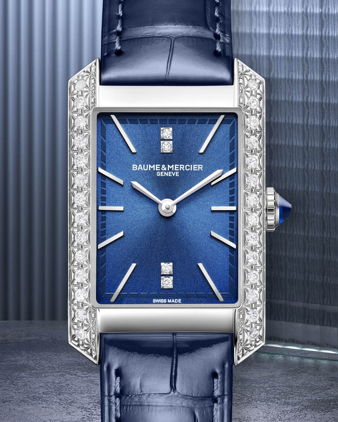 ボーンメルシーのインスタグラム：「Embark on a journey of elegance and grace with the Hampton 10709.  This captivating timepiece tells a tale of delicate feminity and timeless allure. Picture yourself adorned with its rectangular stainless steel case, shimmering with the brilliance of carefully placed diamonds.  Let the Hampton 10709 be your campanion as you create your own story of timeless beauty and grace. -- Hampton 10709 Small size, Quartz, Case set with 28 brilliant-cut diamonds, Dial set with four brilliant-cut, 5 ATM, Interchangeable integrated blue alligator bracelet. -- #BaumeetMercier #Hampton #ShapingTime #ArtDecoInspiration #DailyWatch  #Watches #Watch #InstaWatch #WatchOfTheDay #WatchesOfInstagram #WatchLover #WatchCollector #LuxuryWatch #InstaWatch #Style  #Elegant #WristWatch #Timepiece #WatchMaking  #InstaWatches」