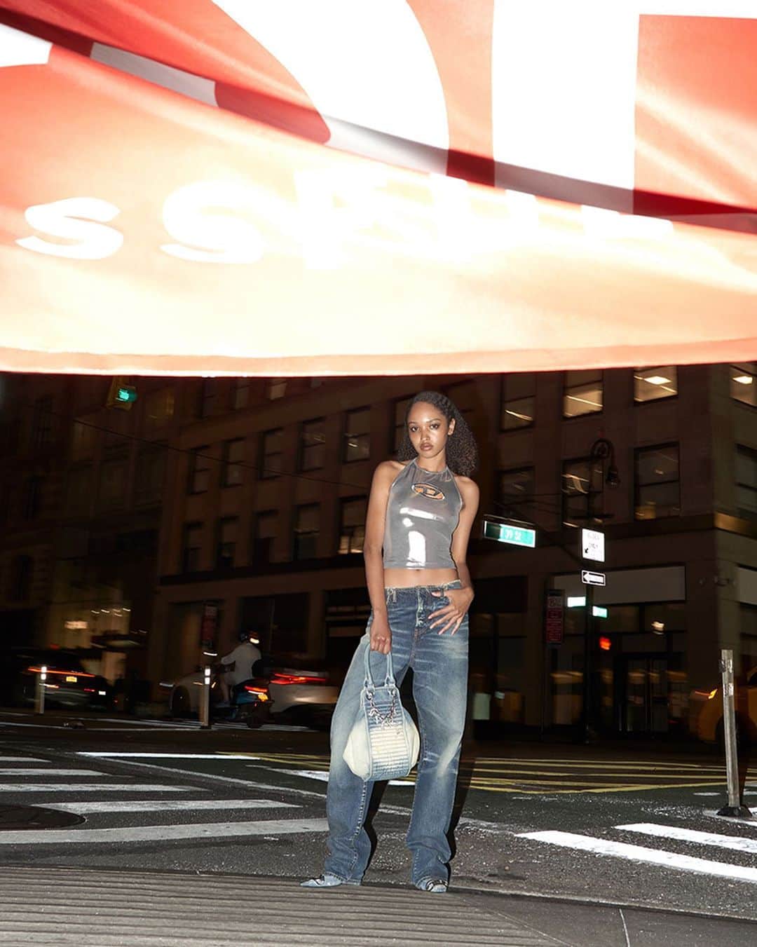 ディーゼルのインスタグラム：「How do you wear your D?  We like ours with a bit of shine. The Oval D hardware logo has many new applications. Embedded across the chest of a silver tank top or placed as a detail on denim stilettos, it embodies an attitude of irreverence, desire and inhibition.  Tap to shop and discover more at the link in bio.  #ForSuccessfulLiving #DieselFW23」