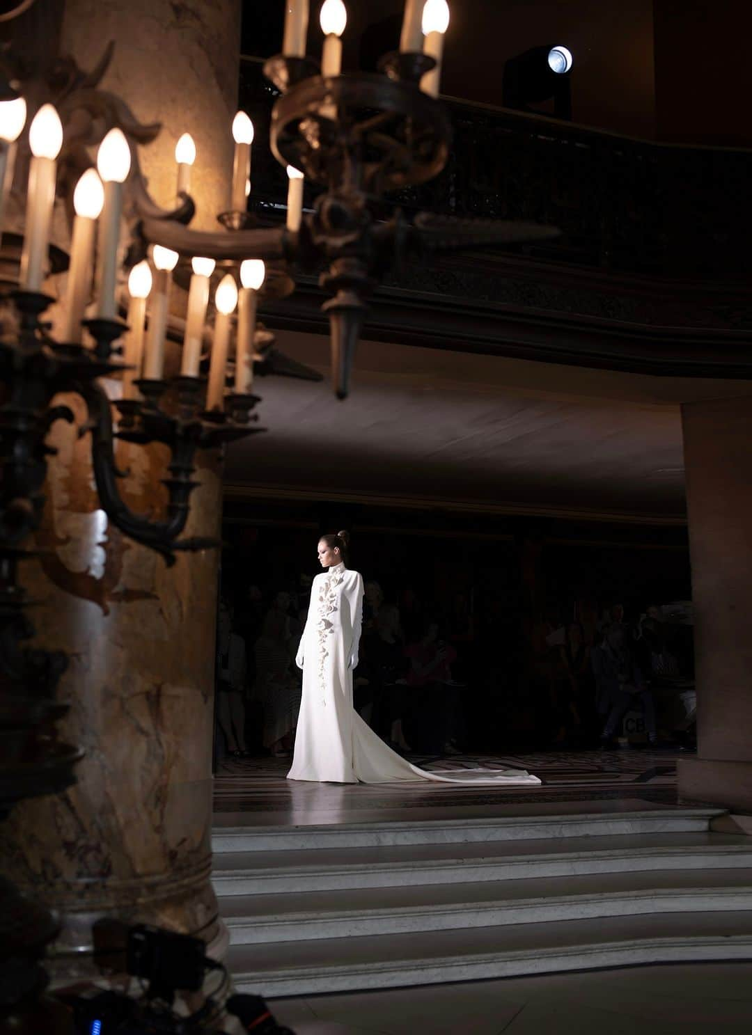 ステファンローランのインスタグラム：「A reversed cape in white wool crepe embroidered with petals of porcelains and crystal from the last Fall Winter 2023 Haute Couture collection.   #StephaneRolland #HauteCouture #FW23」