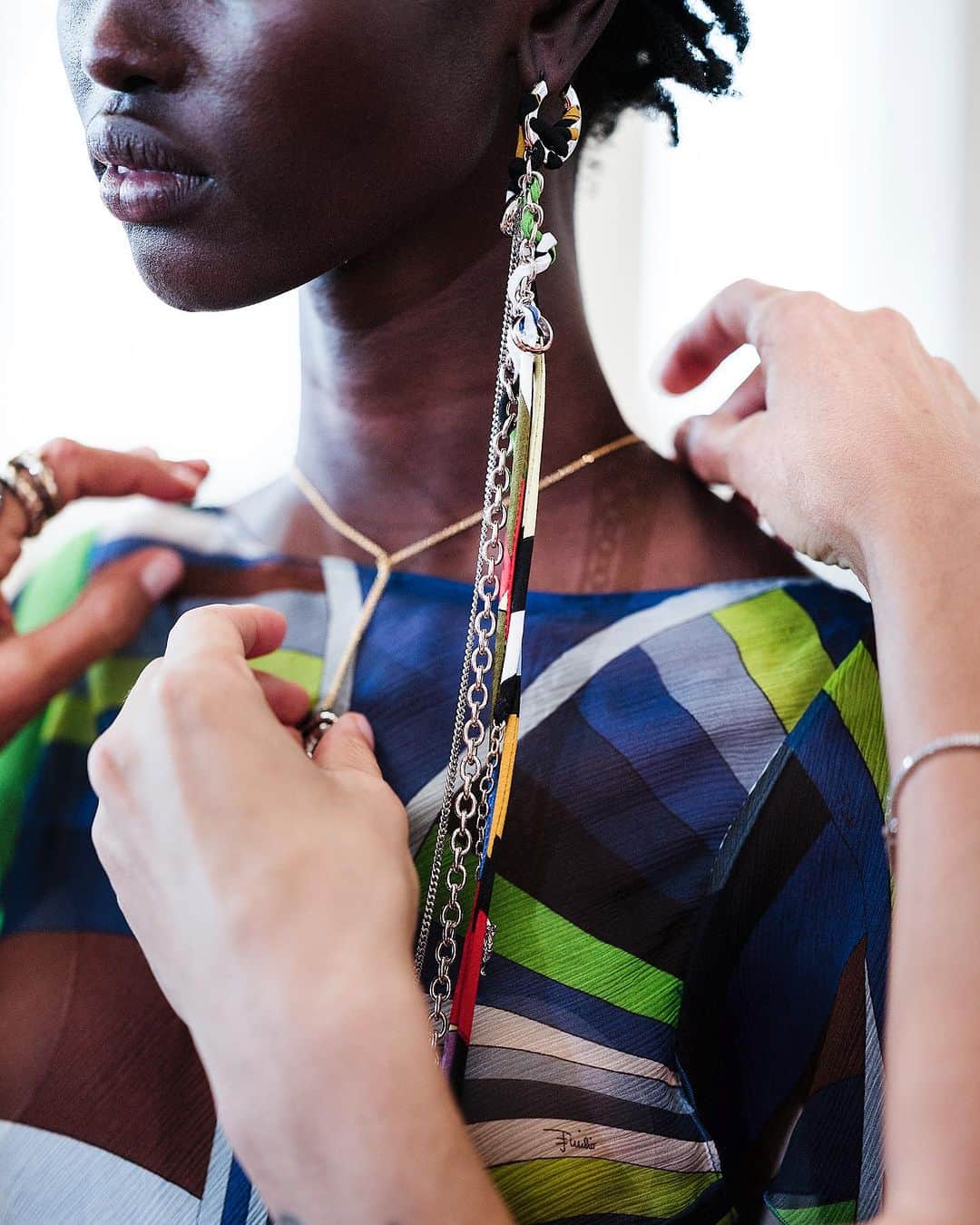エミリオプッチのインスタグラム：「Close-up on Pucci jewelry.   Shot by @edouardcaupeil   #Pucci #InitialsEP」