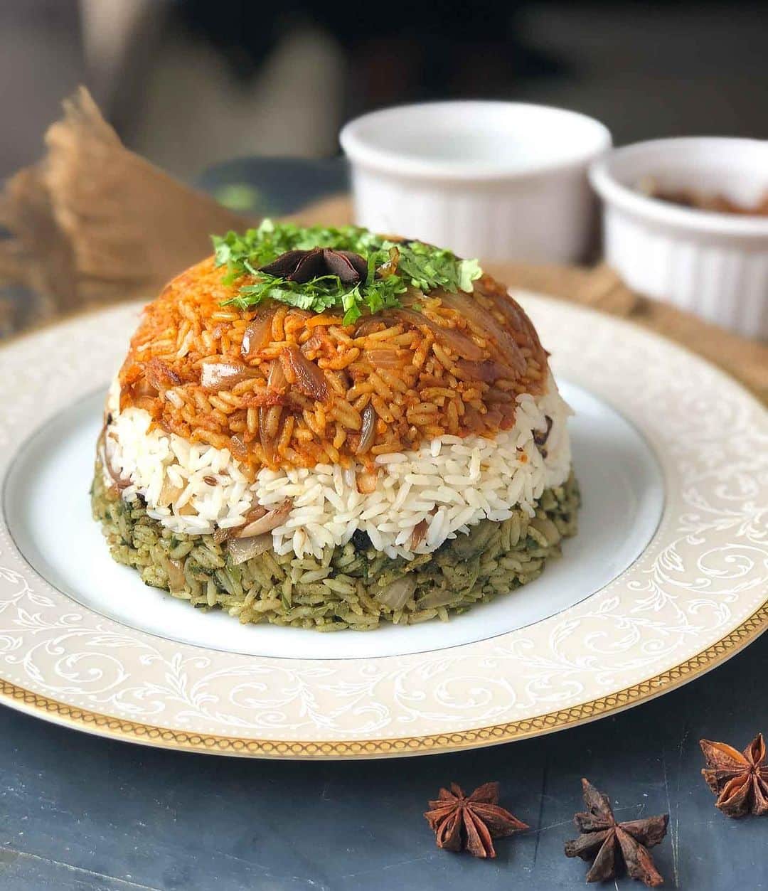 Archana's Kitchenのインスタグラム：「You must try this Layered Vegetable Tricolor Biryani Recipe today. It’s  a lip smacking combination of three differently flavoured biryanis, layered and made to appear like the Indian tricolour.  Comment “Yes” for the recipe link :)」