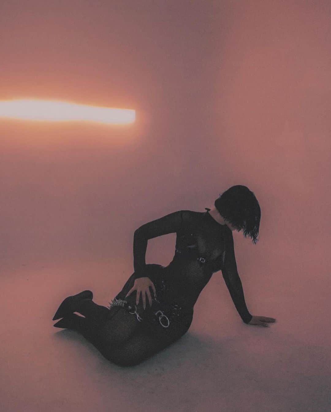 ZANA BAYNEのインスタグラム：「MEZ IN LEATHER ❤️‍🔥  @mezafram shot by @_marcoalexander wearing the Mini Choker Bag with Spiked & Loaded Strap, Black Leather Triangle Bra & Z-String.  Mesh Catsuit by @bustedbrand」
