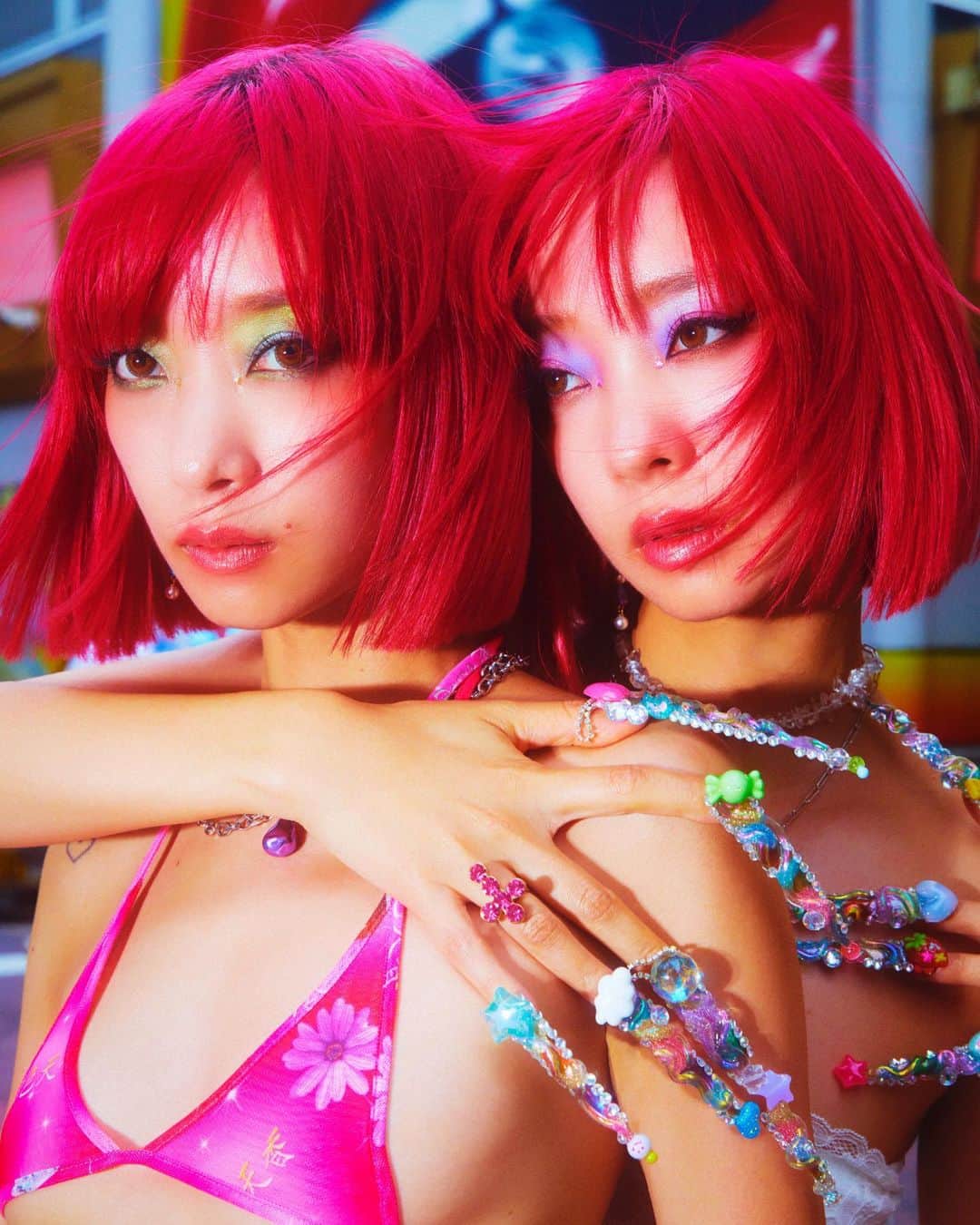 AMIのインスタグラム：「Tokyo Twinz⚡️💥🩷  Creative Director & Stylist: @marinabhl Photographer: @shotaro_yamagoe Make up: @naoyossii Hair: @yuukiyanase Nails: @me_naillls_ Gems: @daichimrtk Production: @nacremgmt Production assistant: @hina_journey Stylist assistant: @yasminatdv  AYA top & bottom: @hu_die_gong_zhu Necklace: @vann_jewellery shoes: @sergiorossi  AMI top: thrifted  skirt: @hu_die_gong_zhu Necklace: @vann_jewellery shoes: @sergiorossi  #amiaya #twins #tokyo」