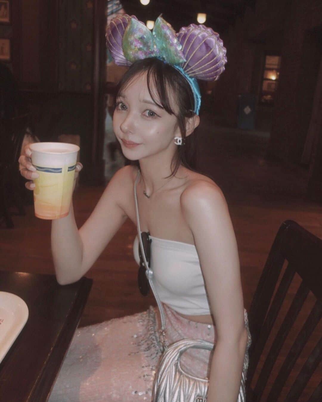 西もなかのインスタグラム：「🧜‍♀️💖⠀ ⠀ Baretop... @fiction_tokyo_official ⠀ Skirt... @girlssociety_official ⠀ Boots / Bag... @miumiu ⠀ 去年買ったスカートがこの日のテーマの⠀ 🧜‍♀️アリエルの友達🧜‍♀️にぴったりだった💓💓⠀」