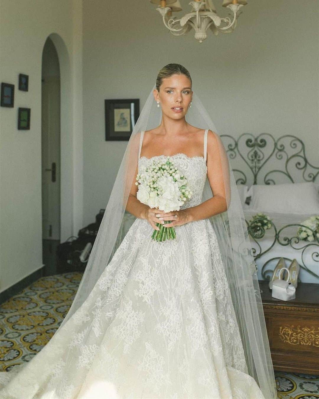 Steven Khalilのインスタグラム：「Congratulations to our beautiful custom couture STEVEN KHALIL bride @tashoakley as featured in @vogueaustralia  ⠀⠀⠀⠀⠀⠀⠀⠀⠀ 'We designed a dress to be so much more than a classic lace wedding dress. We chose hand embroidery that would glisten in the sun with the shapes of coral and lines reminiscent of the sea, covered by a traditional lace and paired with a long lace veil."」