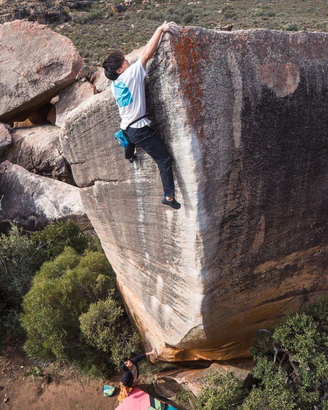 村井隆一さんのインスタグラム写真 - (村井隆一Instagram)「Livin' Large(V16/8C+)✅  Mega psyched! I've done the main goal of this tour!  This line, which is over 8m high, was called the Real Big Project at the time. It was very intimidating to imagine the climbers who tried this in the past fell from the same height as a balcony on the third floor.  The first half consisted of compression moves with friction slopers, and the second half was a mental battle(V11-ish) that required delicate footwork. It was only possible to try in perfect conditions in the early morning (~9:00), evening (17:00~), or cloudy day.  However, the approach takes 45 minutes, so early in the morning there weren't enough time to warm up. In the evening there's only a short time after the rock cool down untill the sunset, so a cloudy day is the best. Due to friction issues, the damage to the finger skin was quite severe. If I tried, I had to rest for 2-3 days. So this cloudy day near the end of the tour was my last chance.  The conditions were great on this day and every move worked perfectly on the second try. I just focused on each hold in front of me, and didn't feel any fear of heights. It would have been really bad if I missed the last move. I'm glad I climbed, but more than that I'm glad I didn't fall.  Thank you to the tour members who helped me with the big hike for days🙏  And huge respect @nalle_hukkataival for putting this mega up!! ____________________________________ 今ツアー最大の目標である「Livin' Large(六段)」が登れた!  発見当時Real Big Projectと呼ばれていたこのラインは高さ8mを超え、過去にこれをトライしたクライマー達が3階のベランダと同等の高さから落ちていたことを想像すると初見の威圧感は半端なかった。  最初の数日間ロープ練に費やした結果、このラインは前半は強度の高いコンプレッションシーケンスで、後半は繊細なフットワークが求められる3段ほどのメンタルバトルであることが判明。そして日光がもろに当たるこのラインを完璧な状態でトライ出来るのは早朝(〜9時)か夕方(17時〜)、もしくはたまに訪れる曇り日に限られた。ただアプローチに45分かかり、早朝は十分にウォームアップする時間が取れず、夕方は影ってから日没までの僅かな時間しか取れないことから、ベストは曇り日を狙うことだった。またフリクション系の課題で、指皮のダメージがかなり酷く、1日トライしたら2〜3日レストを挟まなければならず、ツアー終了間近のこの曇り日はまさにラストチャンスと言える状況だったかもしれない。  この日は気温が低く、コンディションは最高で、1トライ目から4日間出来ていなかった前半パートを突破出来た。が、5mを超えた辺りでビビってしまい諦めのフォール。それから1時間ほど心を落ち着かせてからのセカンドトライ。このトライは全てのムーブが完璧に決まった。ただ目の前にある1手1手に集中しすぎて気付けばリップを掴んでた。高さの恐怖はもはや全く感じなかったけど、もし最後のリップ取りでミスってたら本当にやばかった。登れて良かったけど、それ以上に落ちなくて良かった。  何日もビッグハイクをこなして協力してくれたツアーメンバーに感謝です🙏  Photo @naoki__shimatani   @rokdo_team」7月25日 22時21分 - ryu____1