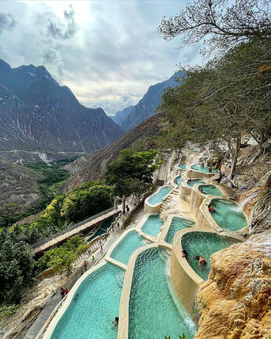 Jason G. Sturgillのインスタグラム：「Mexico photo dump 2. It’s been a whirlwind here and it’s been hard to remember to document everything. One of the things we were really excited to do was to visit the Tolantongo Hot Springs which is about 3 hours North of CDMX. We booked an @airbnb experience with @onewaymexicotrips where they picked us up at 4am in order to beat the crowds and it was worth it. Besides the mind blowing baths there’s an amazing cave to explore and a river that can’t be captured in photo. The other things we’ve done that’s been impossible to capture are the never-ending flea markets. Our favorite was the antique market at Lagunilla which we could have spent the whole day at. We also had a blast going to a Lucha Libre match, their acrobatics were next level, watch the video until the end to see a tiny slice of the show.」