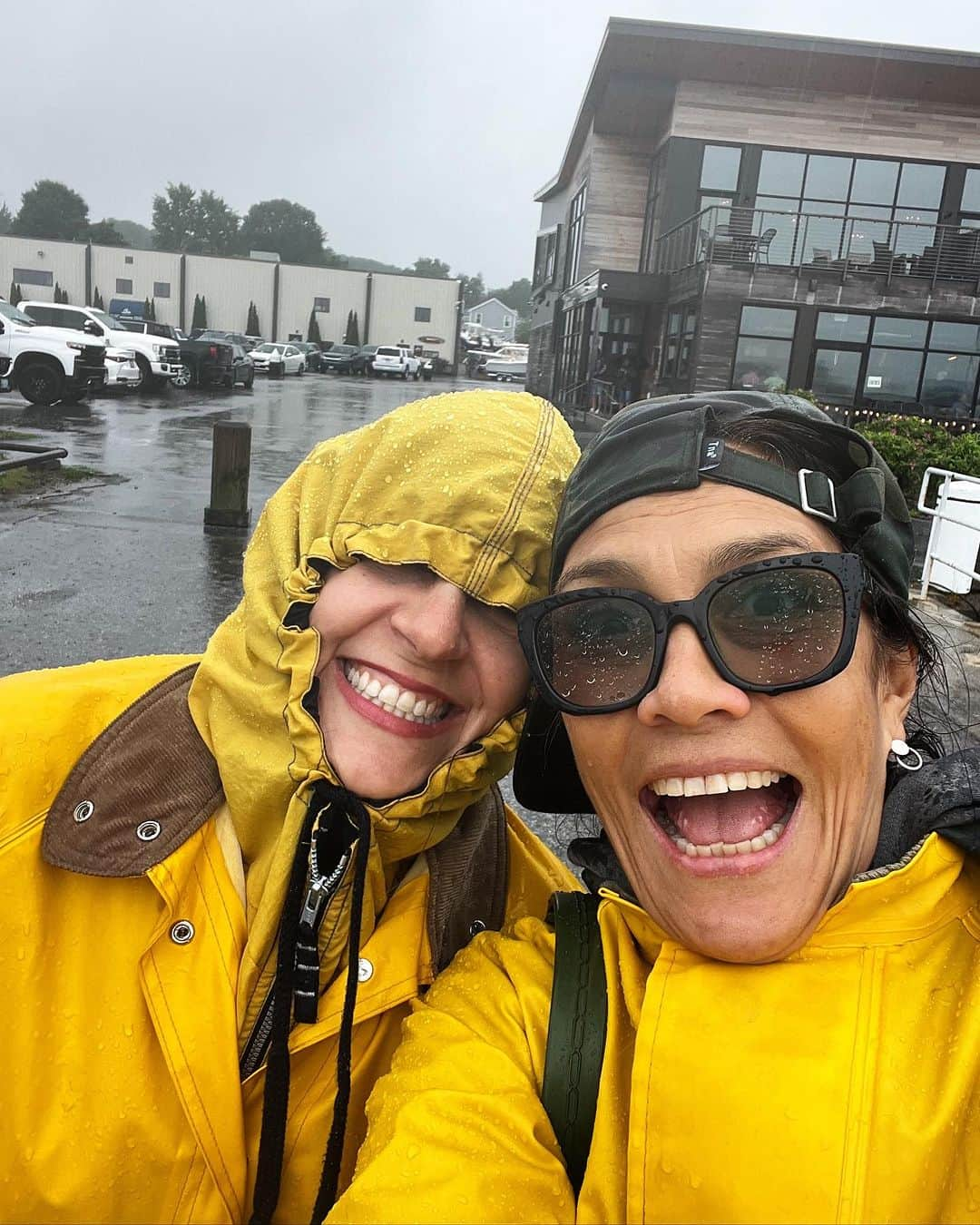 Ilana Wilesさんのインスタグラム写真 - (Ilana WilesInstagram)「Come to Maine, Lucy said. “We’ll stay in a house on a little island. Just drive to Portland and we’ll pick you up by boat.” Cut to us arriving in a torrential downpour. Like the hardest I’ve ever seen it rain in my life. Lucy and Eric were there to pick us up as promised. With double raincoats for us both, rubber flip flops cause Lucy knew I would show up in platform sandals, garbage bags to put over our luggage and wheel barrows to navigate the docks, one step at a time to make sure my flip flops had traction so the wind wouldn’t blow me into the water. When we finally had all our stuff in the boat, they handed Mike a beer and me a can of rosé and then took off into the choppy water. As the rain pelted us in every direction imaginable and I struggled to hang onto both my rosé and the railing for dear life, I shouted above the storm. “HOW LONG DID YOU SAY THIS BOAT RIDE IS TO THE HOUSE??” Lucy shouted back. “TWO HOURS.” Hahahaha. It was ten minutes. Whole thing felt unreal. Like I was in a Wes Anderson movie. Or the final scene of the Truman Show. Is this real life????? That was quite a dramatic intro, Maine!」7月26日 12時29分 - mommyshorts