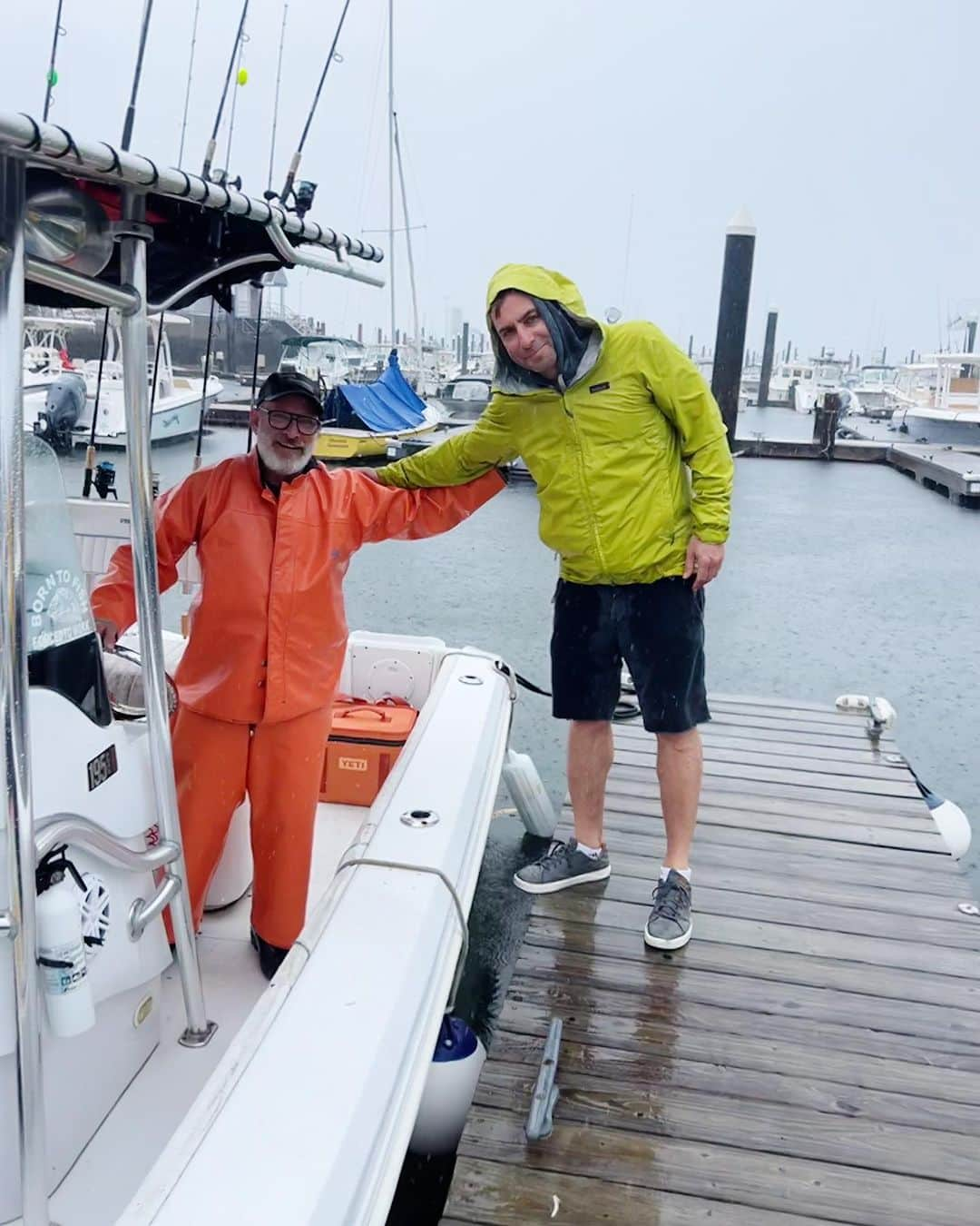 Ilana Wilesさんのインスタグラム写真 - (Ilana WilesInstagram)「Come to Maine, Lucy said. “We’ll stay in a house on a little island. Just drive to Portland and we’ll pick you up by boat.” Cut to us arriving in a torrential downpour. Like the hardest I’ve ever seen it rain in my life. Lucy and Eric were there to pick us up as promised. With double raincoats for us both, rubber flip flops cause Lucy knew I would show up in platform sandals, garbage bags to put over our luggage and wheel barrows to navigate the docks, one step at a time to make sure my flip flops had traction so the wind wouldn’t blow me into the water. When we finally had all our stuff in the boat, they handed Mike a beer and me a can of rosé and then took off into the choppy water. As the rain pelted us in every direction imaginable and I struggled to hang onto both my rosé and the railing for dear life, I shouted above the storm. “HOW LONG DID YOU SAY THIS BOAT RIDE IS TO THE HOUSE??” Lucy shouted back. “TWO HOURS.” Hahahaha. It was ten minutes. Whole thing felt unreal. Like I was in a Wes Anderson movie. Or the final scene of the Truman Show. Is this real life????? That was quite a dramatic intro, Maine!」7月26日 12時29分 - mommyshorts