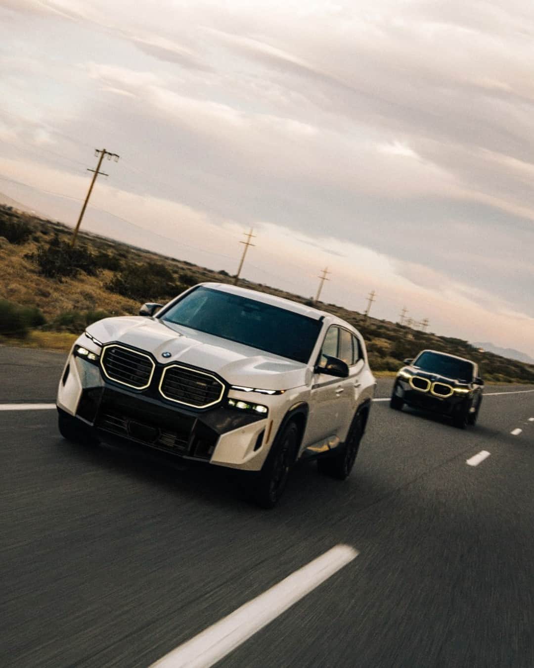 BMWのインスタグラム：「Empowered to stand out from the crowd 🖤🤍  The BMW XM. #BMWXM #BMW #BMWM  __ BMW XM : Combined fuel consumption, weighted: 1.6–1.4 l/100 km. Combined power consumption, weighted: 35.8–32.9 kWh/100 km. Combined CO2 emissions, weighted: 36–32 g/km. All data according to WLTP. Further info: www.bmw.com/disclaimer」
