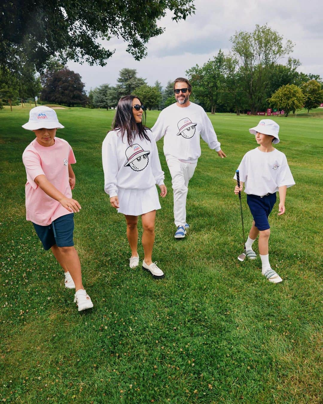 evianのインスタグラム：「⛳️ evian x Malbon is back!  To celebrate the 29th edition of The Amundi Evian Championship hosted right here at our pristine source 🗻 is a striking new collection developed from cult brand @malbongolf   The sleek yet functional silhouettes invite golf-lovers to embrace the joys of nature with evian and the revitalising activity of this great sport 🏌️‍♀️   Alongside this collab we’re excited to return to our ‘Live Young’ mantra as a reflection of our commitment to wellness regardless of age. This celebrates the joy of hydration as an act of rejuvenation. An act of self-care that radiates from the inside out  💧  Click bio link to see full collab range.   #malbon #evianchamp #malbonxevian #amundievian #liveyoung」