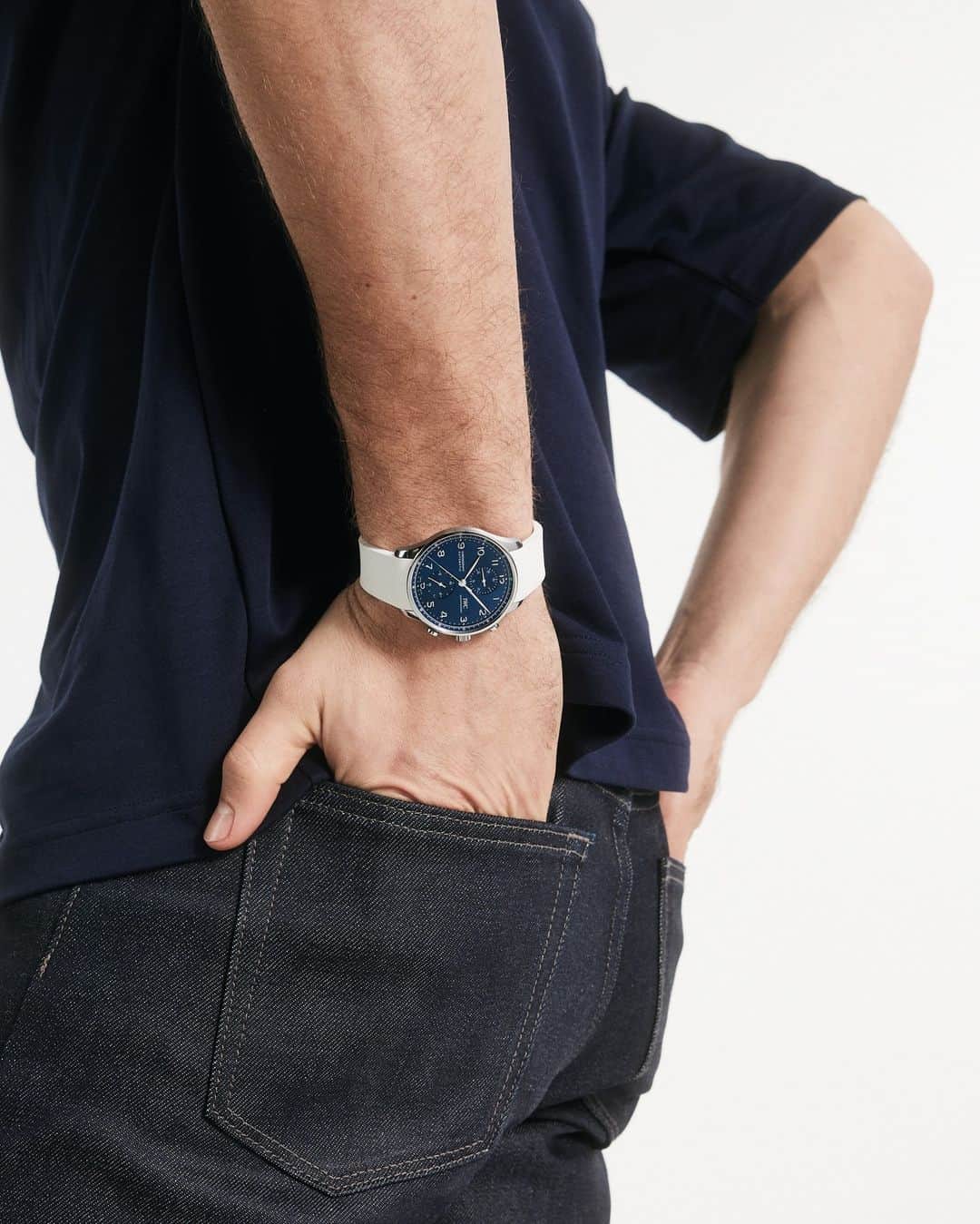 IWCのインスタグラム：「Design cues.  #IWCportugieser | #TheReference  🔗Link in Bio  Ref. IW371606 - combined with a textured white rubber strap. 📍 Visit your IWC boutique or retailer to discover the variety of strap options available.」