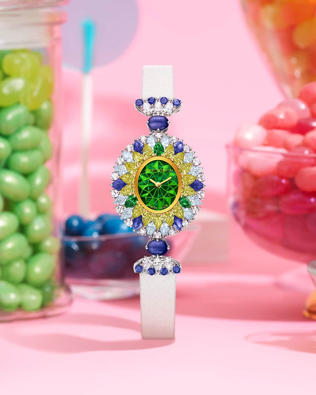 ハリー・ウィンストンのインスタグラム：「With a sprinkling of colorful gemstones, this Winston Candy timepiece is bound to make your visit to the Winston Candy Shop the sweetest time of all. Tap the link in bio to adorn your wrist with this saccharine design. #HarryWinston #WinstonCandy」