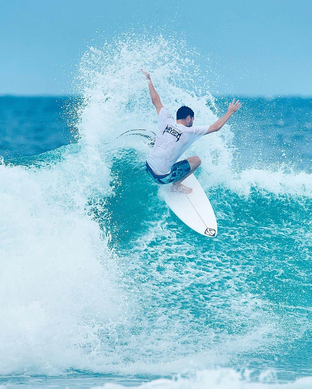 ロストのインスタグラム：「Making the most of Summer swells in the Highline Boardshort and Mayhem Designs Tee @dane.mackie #lostsurfboards #lostclothing」