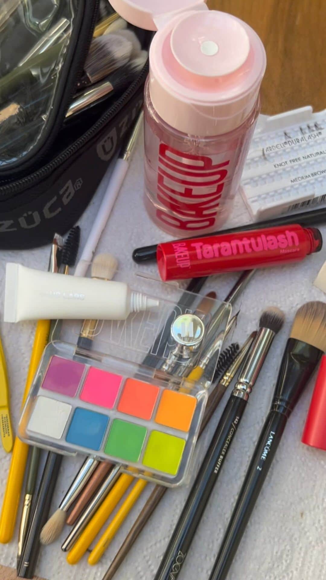 JO BAKERのインスタグラム：「White paint @hauslabs that gives you that fun opaque base ~ layered with white shadow from @bakeupbeauty #neon palm palette followed by some #tarantulash mascara @bakeupbeauty on #ntashalyonne for @miumiu #jobakermakeupartist #mskeupoftheday」