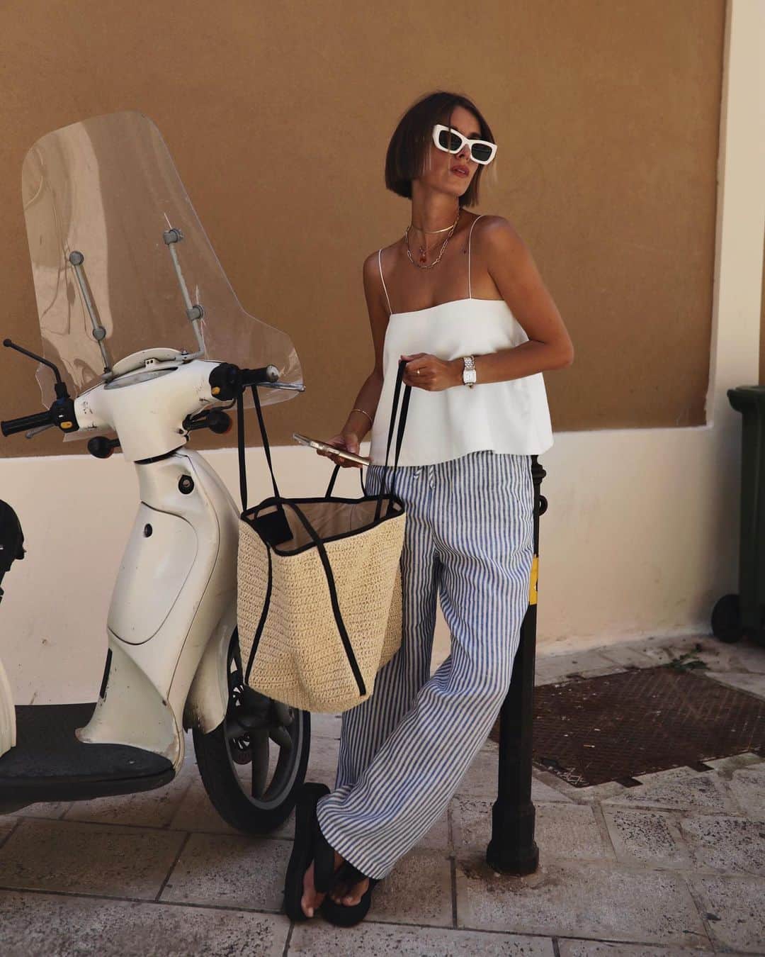 YOOX.COMのインスタグラム：「@andicsinger knows how to create a stylish (and fresh) look for summer in the city! Discover more on #YOOX」