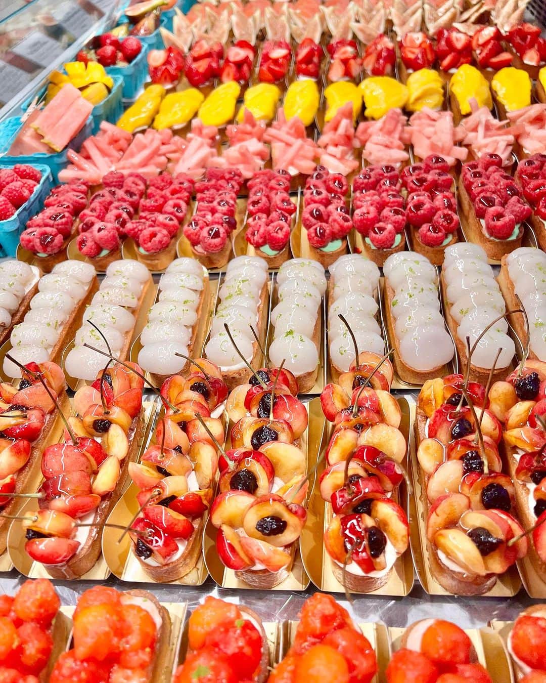 DOMINIQUE ANSEL BAKERYのインスタグラム：「Our beautiful Summer Marché fruit tarts, here in Soho through Sunday, August 6th only. 🥭🍉🍍🥝🍓🍊🍒🍑🫐」
