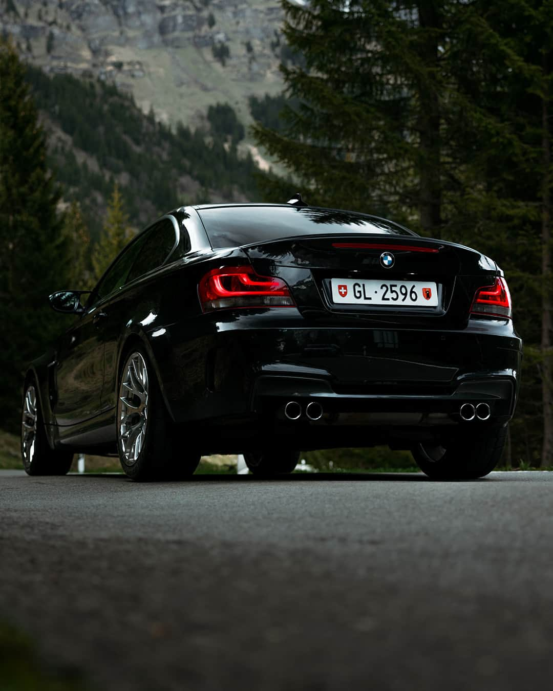 BMWさんのインスタグラム写真 - (BMWInstagram)「#BMWRepost 📸 @girlsgear @simon_hefti  Rocking the road ahead ⛰️  The 2012 BMW 1 Series M Coupé. #BMWClassic #BMW」7月29日 22時00分 - bmw