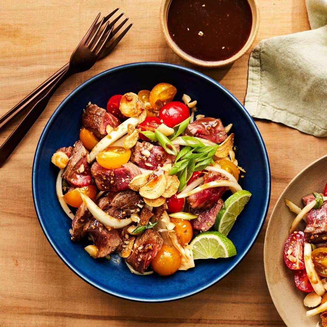 Food & Wineさんのインスタグラム写真 - (Food & WineInstagram)「Have you ever had beef poke? This take on the Hawaiian staple features seared pieces of prime rib tossed in a savory-sweet soy sauce dressing. Tomatoes and onions add bright, fresh flavor, while fried garlic and macadamia nuts bring the crunch. Suffice it to say, @trishmanzanero's recipe should be on your to-do list.   📸: @protazio, 🥄: @margaretdickey, 🍽: @shellroyster」7月30日 11時15分 - foodandwine