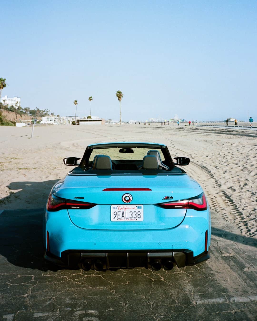 BMWのインスタグラム：「Send this to someone you want to take to the beach.  📸: @instaexotics #BMWRepost   The BMW M4 Competition Convertible. #THEM4 #BMWM #M4 #BMW #MPower __ BMW M4 Competition M xDrive Convertible: Combined fuel consumption: 10.2 l/100 km. Combined CO2 emissions: 233–231 g/km. All data according to WLTP. Further info: www.bmw.com/disclaimer」