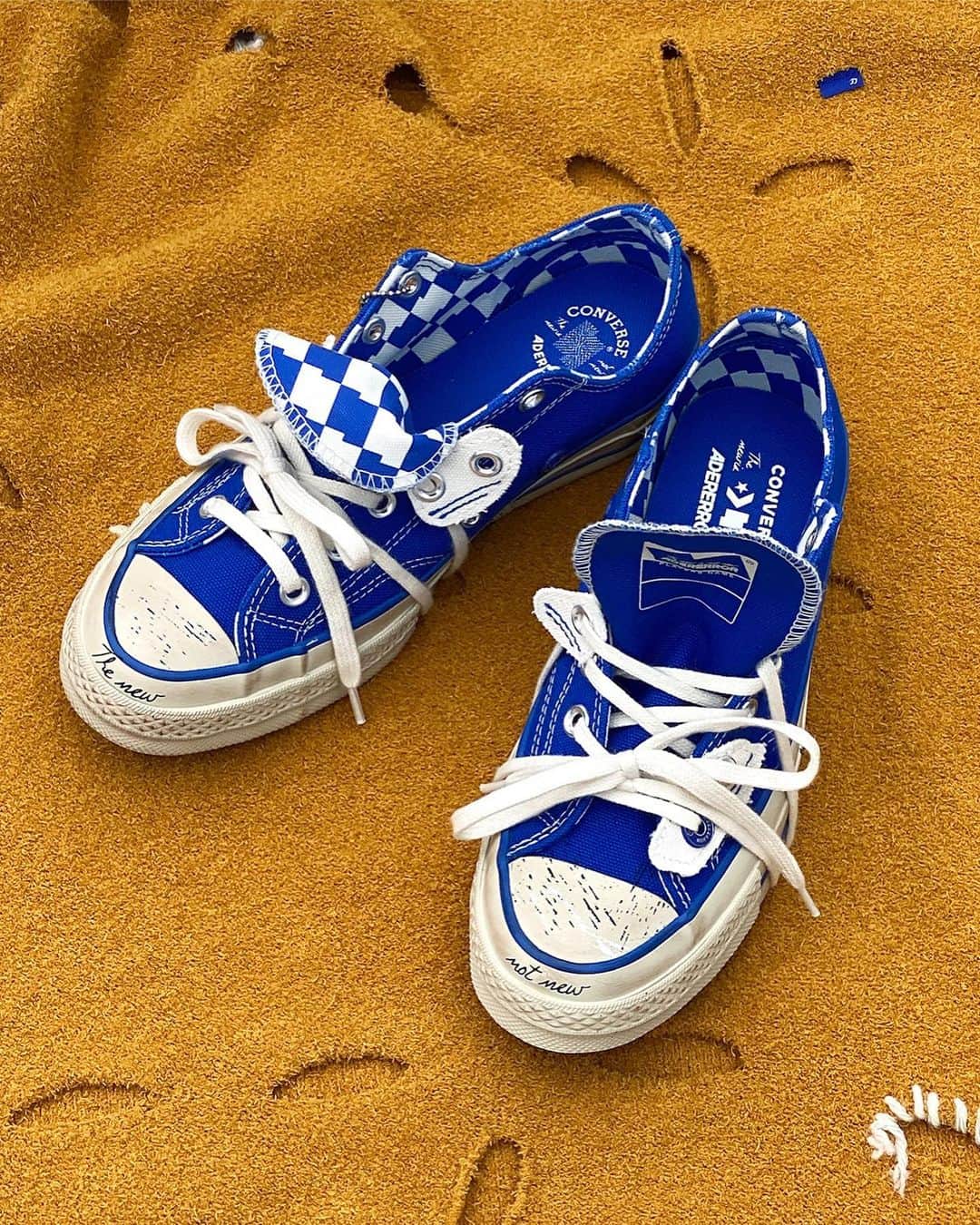 converseのインスタグラム：「Seoul-based @ader_error brings the well-worn, well-loved look to a brand new collection of Chuck 70s and SHAPES apparel. #CreateNext  Shop the drop, featuring distressed details and layered fabrics, tomorrow, August 1 on Converse.com.」