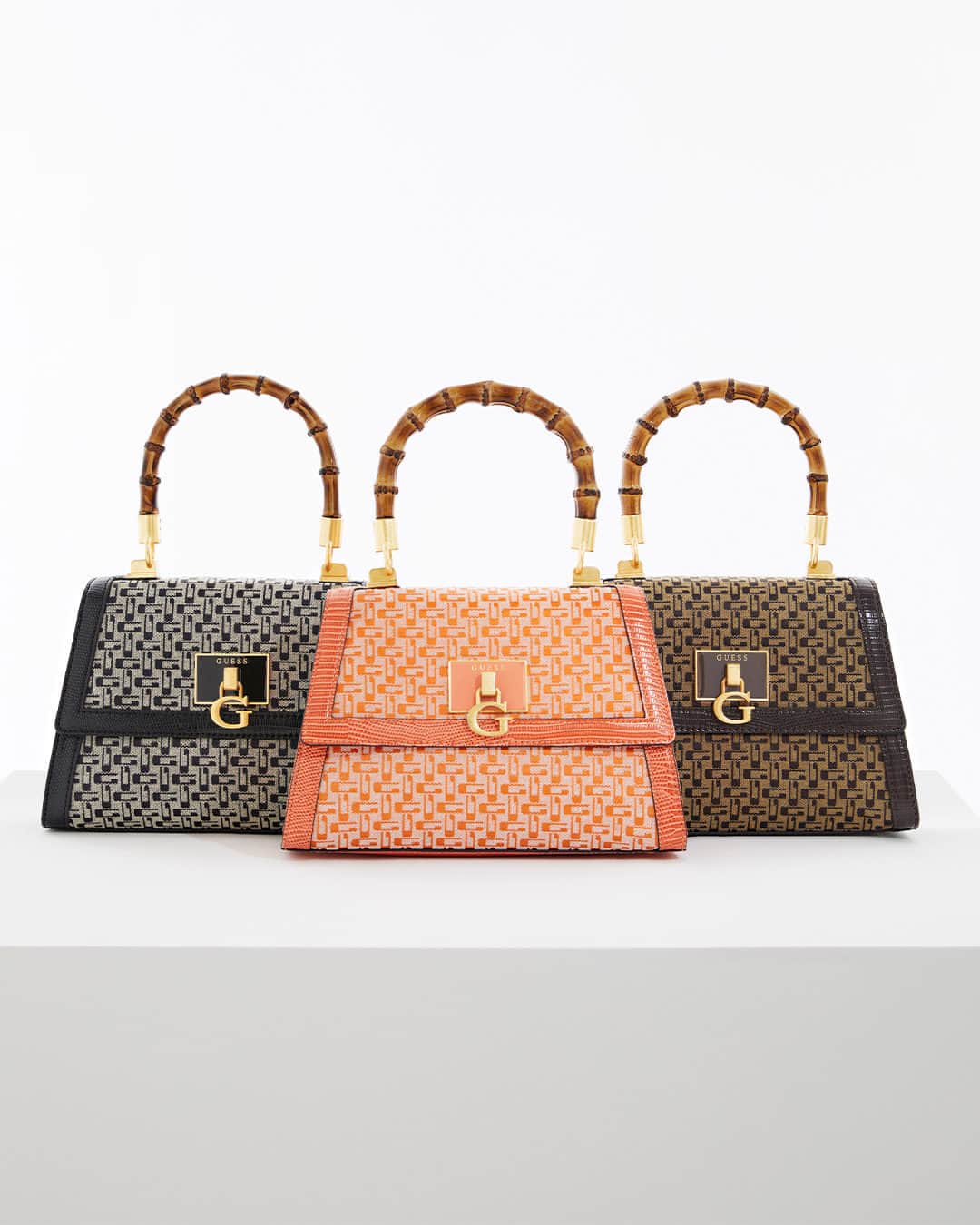 ゲスのインスタグラム：「The Stephi Bamboo Fold-Over Satchel in 3 brilliant colors. #GUESSHandbags」