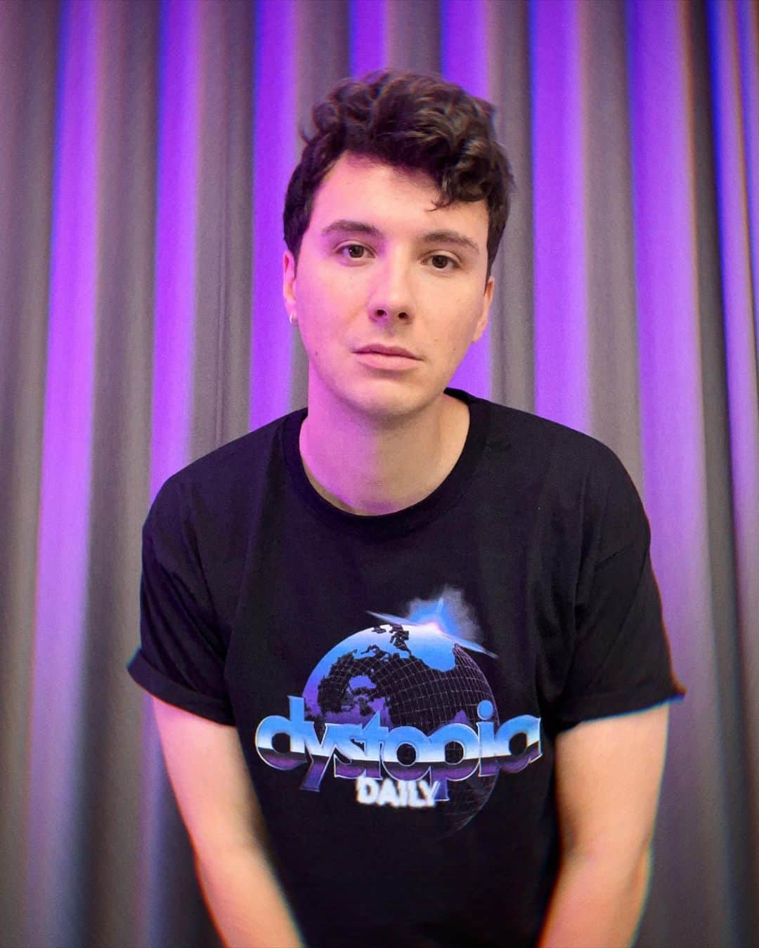 ダニエル・ハウウェルのインスタグラム：「DYSTOPIA DAILY COMMEMORATIVE TSHIRT LIMITED DROP   🌍shop.danielhowell.com 🌎us.shop.danielhowell.com  i hope this garment reminds you of the good times you briefly distracted yourself with some content before the collapse of society」
