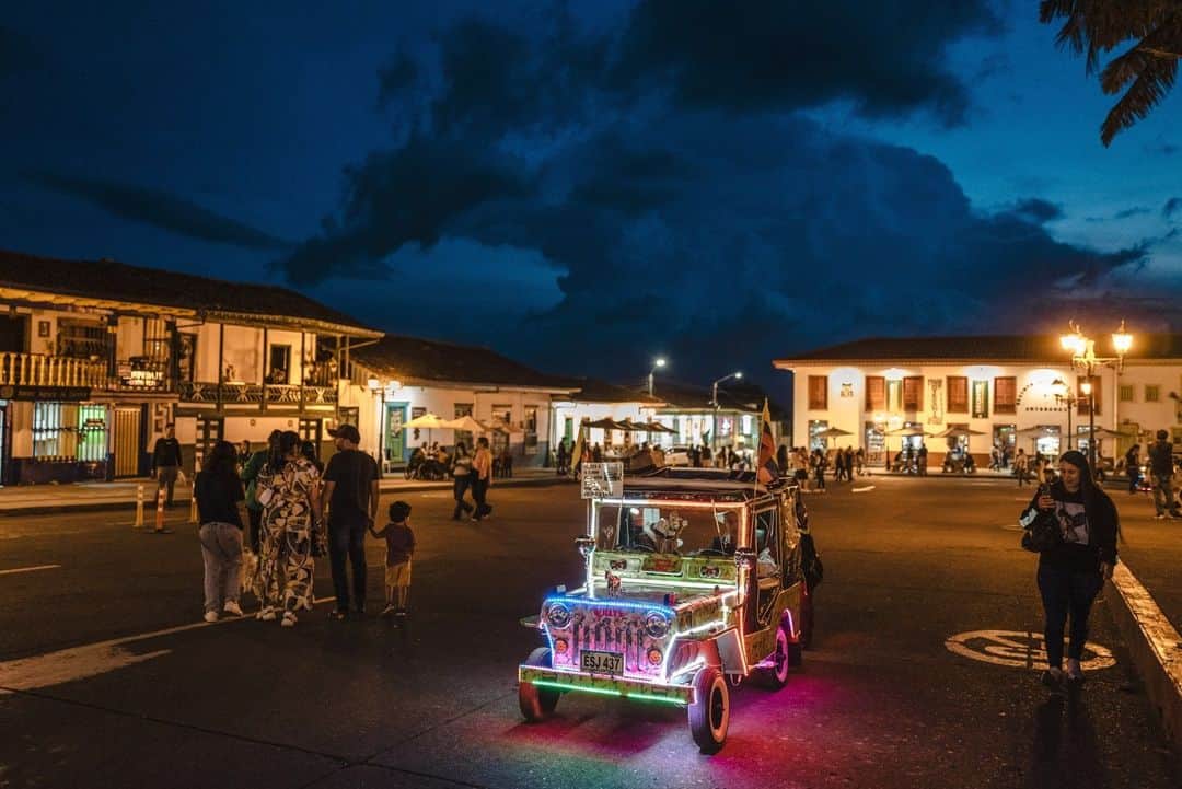 National Geographic Travelさんのインスタグラム写真 - (National Geographic TravelInstagram)「Photo by Juan Arredondo @juanarre | Children are pushed through the center of the town of Salento, Colombia, in a small version of a Willys jeep as part of a tourist attraction. Located in the coffee-growing region of the country and near the Cocora Valley, Salento is home to the Ceroxylon quindiuense, or Quindío wax palm, Colombia's national tree. The town has become a favorite destination for tourists who enjoy hiking near Los Nevados National Natural Park.   To see more from Colombia, follow me @juanarre.」8月2日 6時30分 - natgeotravel