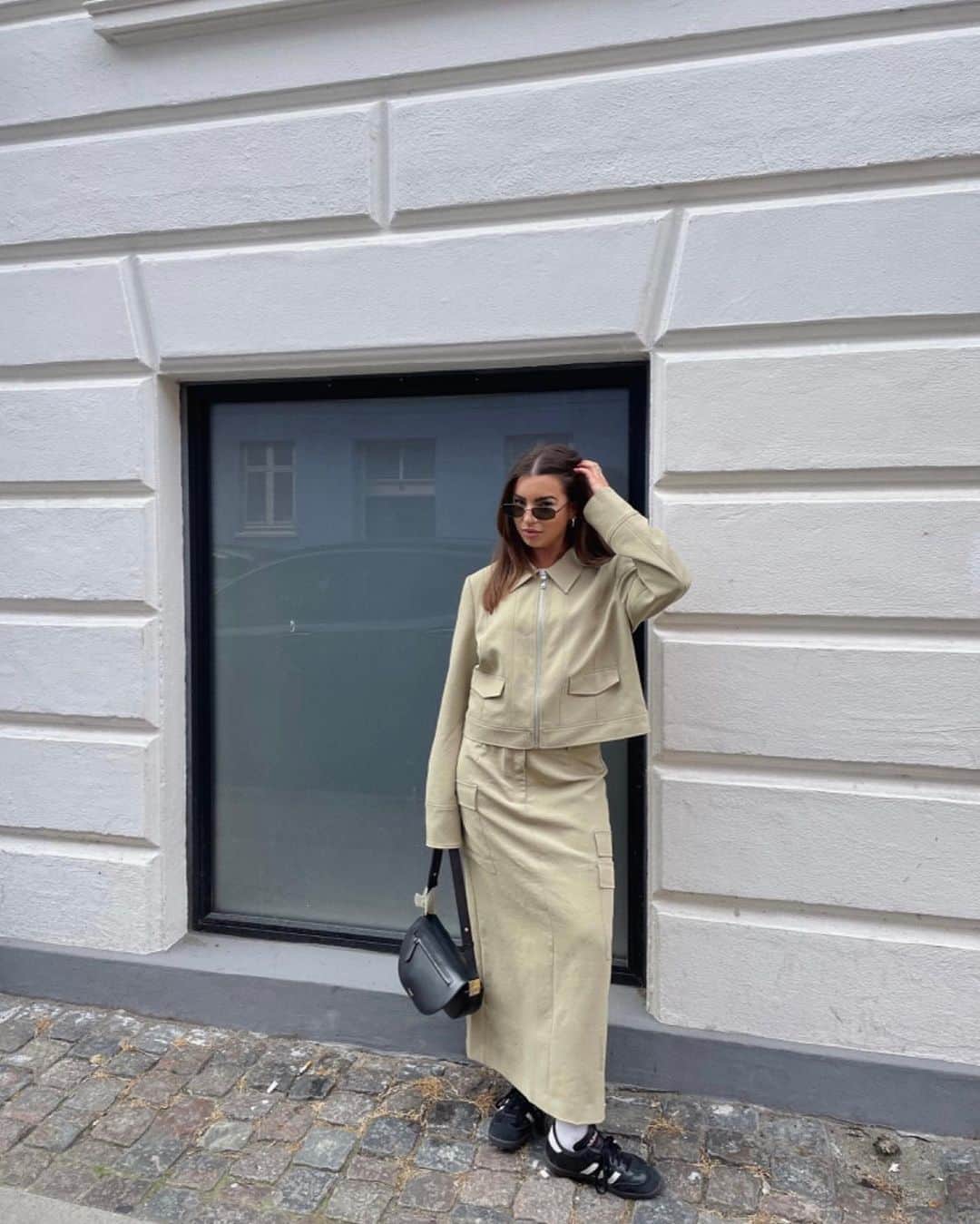 KOOKAI のインスタグラム：「Snapped in KOOKAÏ •• Tap to shop the Ariel Staple Jacket & Cargo Midi Skirt, available in boutiques and online #kookai」