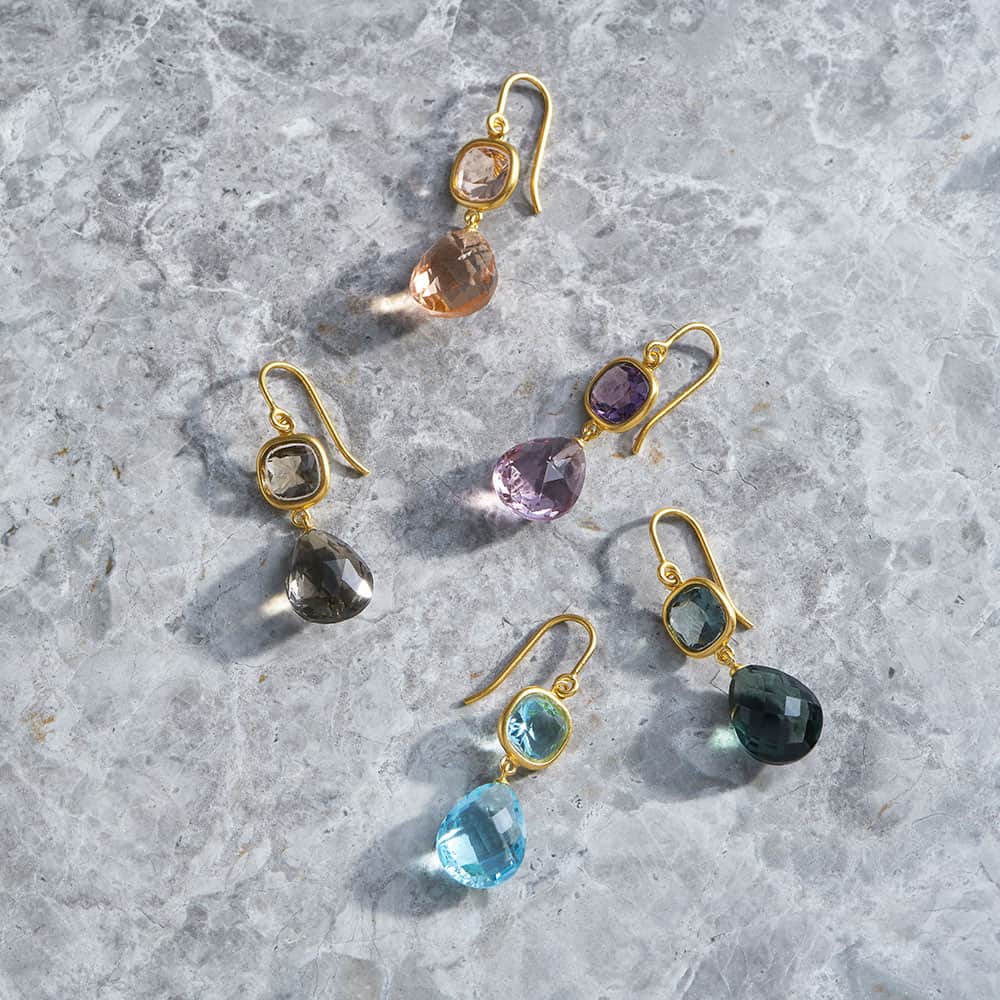 ジュリーサンドラゥのインスタグラム：「Introducing a perfect blend of elegance and femininity: the Olivia earrings. With their classic silhouette and sophisticated hues, these colourful earrings exude timeless charm, effortlessly elevating your style 🍭 ​​​​​​​​​ #juliesandlau」