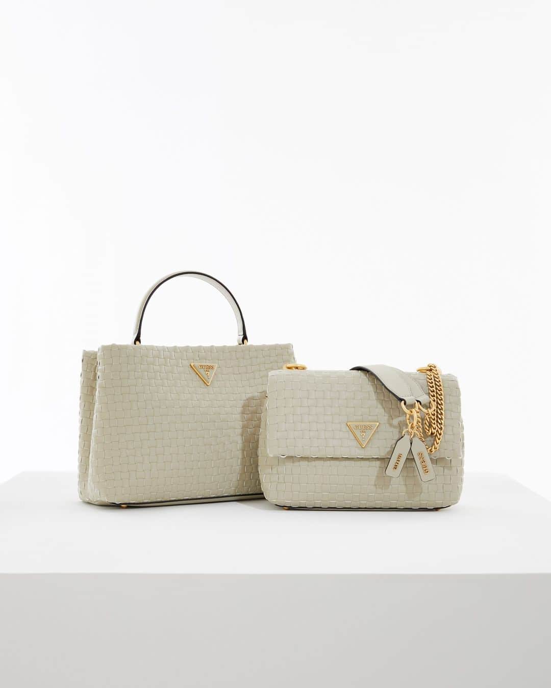 ゲスのインスタグラム：「The Lisbet Woven Satchel and Crossbody feature pebbled faux-leather, woven design and antique bronze-tone hardware. #GUESSHandbags」