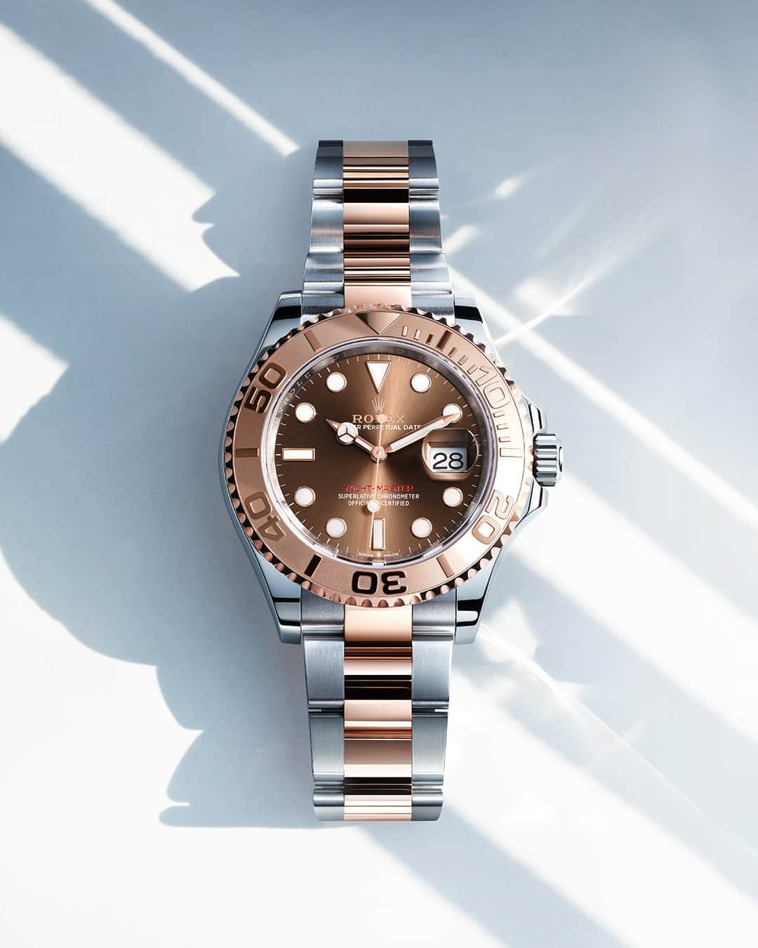 Harrodsのインスタグラム：「Set sail. The Rolex #YachtMaster 40 in Oystersteel and Everose gold with an Oyster bracelet. The Everose gold’s rich tones complement the exclusive sunray-finish chocolate dial and evoke a luxurious warmth.  Find #Rolex in Fine Watches on the Ground Floor.  #Harrods #HarrodsFineWatches #OfficialRolexRetailer」
