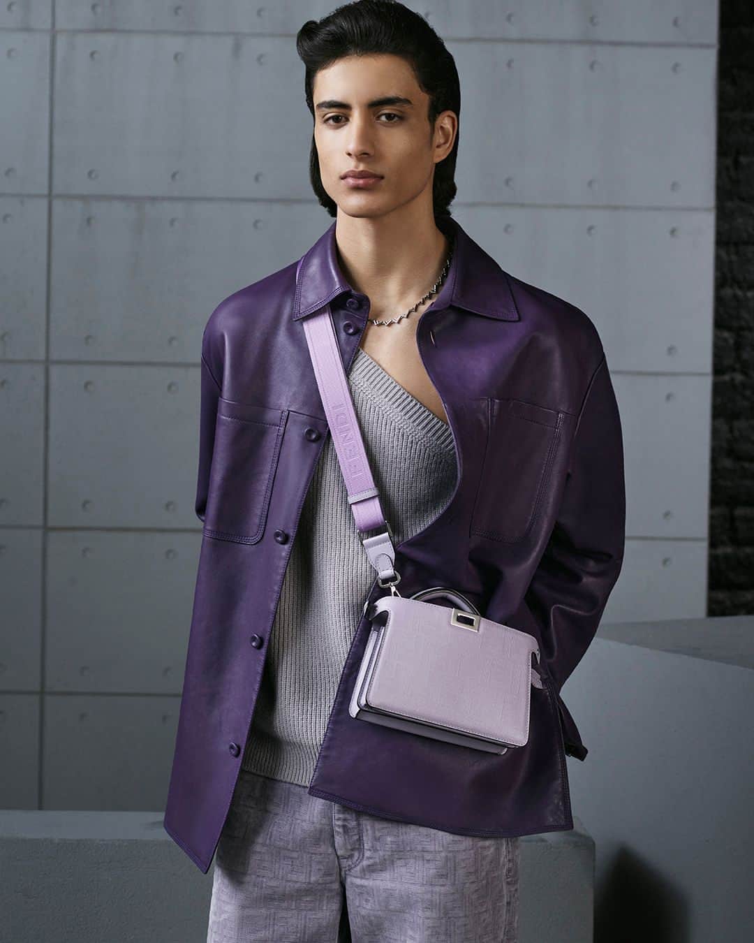Fendiのインスタグラム：「The newest reinterpretation of the icon, the essential #FendiPeekaboo ISeeU XCross, in the highlight colour of #FendiFW23.⁣ ⁣ Artistic Director of Accessories and Menswear: @silviaventurinifendi ​⁣ Artistic Director of Jewellery: @delfinadelettrez​⁣ ⁣ Photography: @brunostaub ⁣ ⁣ Styling: @ganio⁣ Makeup: @samiamohsein⁣ Hair: @ramoneyluv⁣ ⁣ Casting: @piergiorgio⁣ ⁣ Model: Yoesry Detre」
