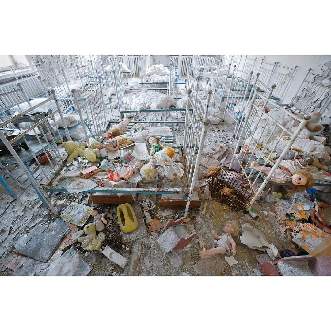 Gerd Ludwigさんのインスタグラム写真 - (Gerd LudwigInstagram)「Silent nursery inside the Chernobyl Exclusion Zone. On the day the Nuclear Power Plant’s reactor #4 blew up, children oblivious to the nuclear accident played in this kindergarten of the reactor’s company town, Pripyat. The following day they were evacuated and had to leave everything behind – even their treasured dolls and toys.  I have been given the rare opportunity to return to the Chernobyl Exclusion Zone and reactor #4 itself to document the highly contaminated areas beneath the New Safe Confinement and meet with victims, liquidators, and the few remaining returnees who are still living in the Zone.   As traditional media outlets lack the necessary funds to support long-term reporting, I have once again turned to the Kickstarter community, colleagues, friends, and followers for assistance in this endeavor.   Tap the link in bio to learn more and support my Kickstarter campaign.  @thephotosociety #Chernobyl #Chornobyl #TheNextChapter」8月3日 20時00分 - gerdludwig