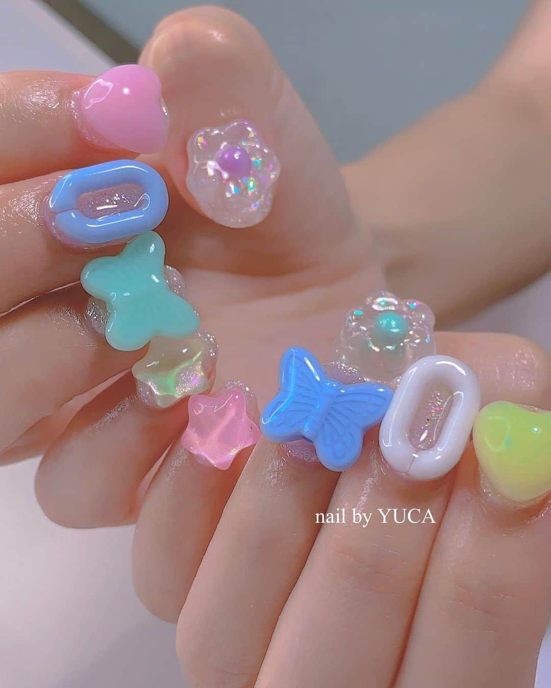 YUCAのインスタグラム：「Pastel🦋🛼☁️⭐️ ⁡ ⁡ ⁡ #パステルネイル #pastelnails  #nail #ネイル #젤네일 #네일  #tettynail #유카네일 #美甲 #yucanail」