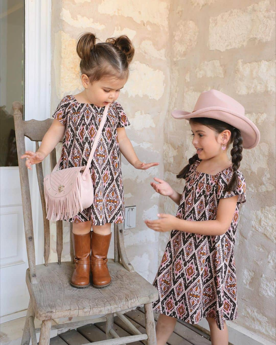 Sazan Hendrixさんのインスタグラム写真 - (Sazan HendrixInstagram)「Hang on like Amari y’all! The countdown to fall begins! 🤣Dressed the girls in head to toe cuteness from @childrensplace! Ya’ll think Amari will make the same face in the last slide when they look back on their childhood and remember a mom who was *slightly* obsessed with the matching outfits era 🤠 #ad #matchingoutfits」8月4日 0時24分 - sazan