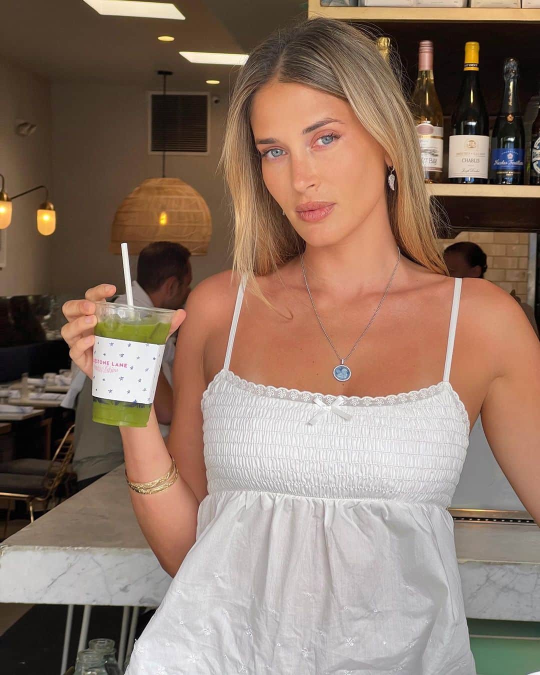 FRANKIES BIKINISのインスタグラム：「to celebrate our 3rd year partnering with @bluestonelane for our montauk pop-up, we created a refreshing iced matcha with tropical notes of passionfruit & papaya. 🥭🍵 “frankies bikinis summer matcha” is now available at all locations🥤」