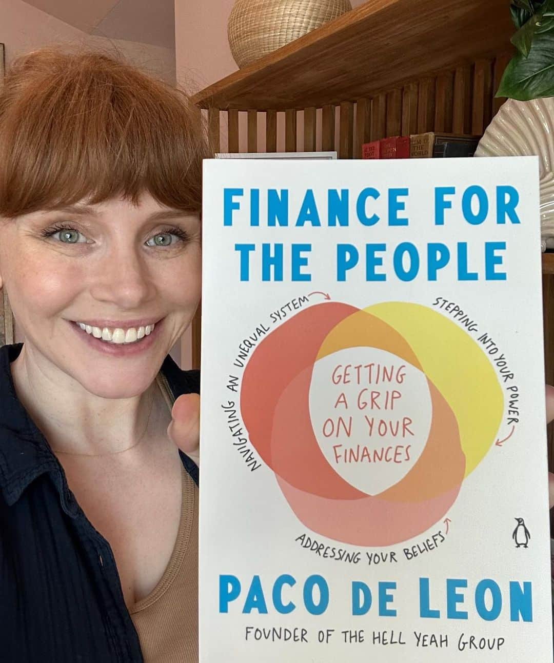 ブライス・ダラス・ハワードのインスタグラム：「“Remember that you coming into your power is a small, radical act within your circle of control.” ~ Paco de Leon, author, illustrator, musician, personal finance expert, and founder of @thehellyeahgroup⁣ ⁣ I’m such a fan of Paco and her work, from her newsletter, to her various columns, to her podcast — and I’ve even worked with Hell Yeah Bookkeeping and gotten tons of invaluable advice. I so admire how she’s focused on a niche that is very important to me: the intersection of creativity, capitalism, and social justice. I cannot emphasize how much I respect her work.⁣ ⁣ Paco’s book “Finance for the People” (which was also just released as an audiobook!) normalizes honest money conversations and with a special attention to the folks who the financial system is stacked against. It’s a wonderfully illustrated and practical guide to navigating your financial life, no matter your financial situation. And with her own creative background, Paco offers so much with artists in mind.⁣ ⁣ I’ll be doing a deep dive on Paco’s incredible resources in my free newsletter this weekend, so don’t forget to subscribe at the link in bio before Sunday! 🔗⁣ ⁣ Swipe ⏪ for a preview of Paco’s Pyramid of Financial Awesomeness 💰⁣ ⁣ [ID: Wearing a navy blue overshirt and a light brown top underneath, BDH smiles and holds a copy of “Finance for the People” next to her face. The cover is of three concentric circles: (1) Stepping into your power, (2) Addressing your beliefs, and (3) Navigating an unequal system. Where the circles overlap reads, “Getting a grip on your finances.”]」