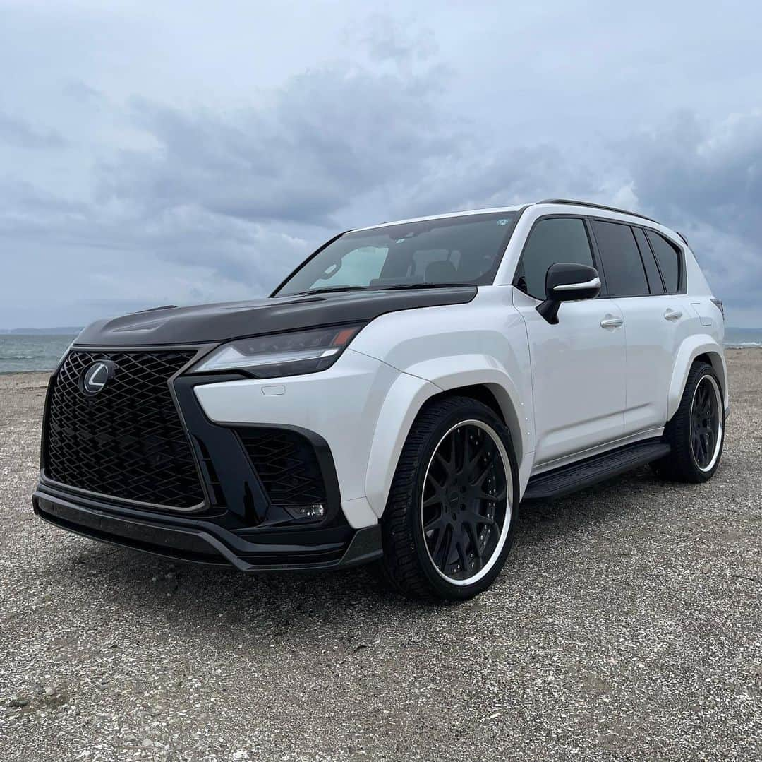 Spirits Artisanのインスタグラム：「LEXUS LX600 FSPORT installed Artisan spirits multi component body kit with Carbon version + New full titanium 4tail exhaust on Motorfan festa2023!  -Front half spoiler(Carbon) -Front bumper garnish(Carbon) -Over fender kit +50mm -Roof spoiler(Carbon) -Rear gate spoiler(Carbon) -Rear half spoiler set(Carbon + FRP) -Bonnet hood with Duct(Carbon) -Full titanium center pipe -Full titanium exhaust system 4tail version -Forged multi piece wheel CORART A7 24inch  Special Thanx for @yokohama.rubber_jp  USA : @evasivemotorsports @butlertire Canada : @advanced_auto_salon @otto.auto.service China : #bondchina Hong kong : @nigeljdmparts Taiwan : #車庫小舗 Russia : @suv.project Kazakhstan : @spoiler.kz Indonesia : @premierautowerkz Philippine : @jworksunlimited @artisanspiritsph Singapore : @mwsautoworks Thailand : @prodriveshop India : @racetechindia Malaysia : @donloh2007 Bahrain : @kanooperformance Kuwait : @hamad_skyline UK : @streettracklife Australia : @import_monster @traum06996 @car_life_staff @sunyard @bondosaka #bondourawa @bondtokyo @bond_omiya @bondoiimura @ysr0443 @cs.forme_1 @office_k_tokyo @blitz_japan_official @artisan.ceravi @artisan.nobu  #artisanspirits #artisan #asms #lexus #lexususa #lexuslx #LX600 #fujispeedway #motorfanfesta #lexustuned」