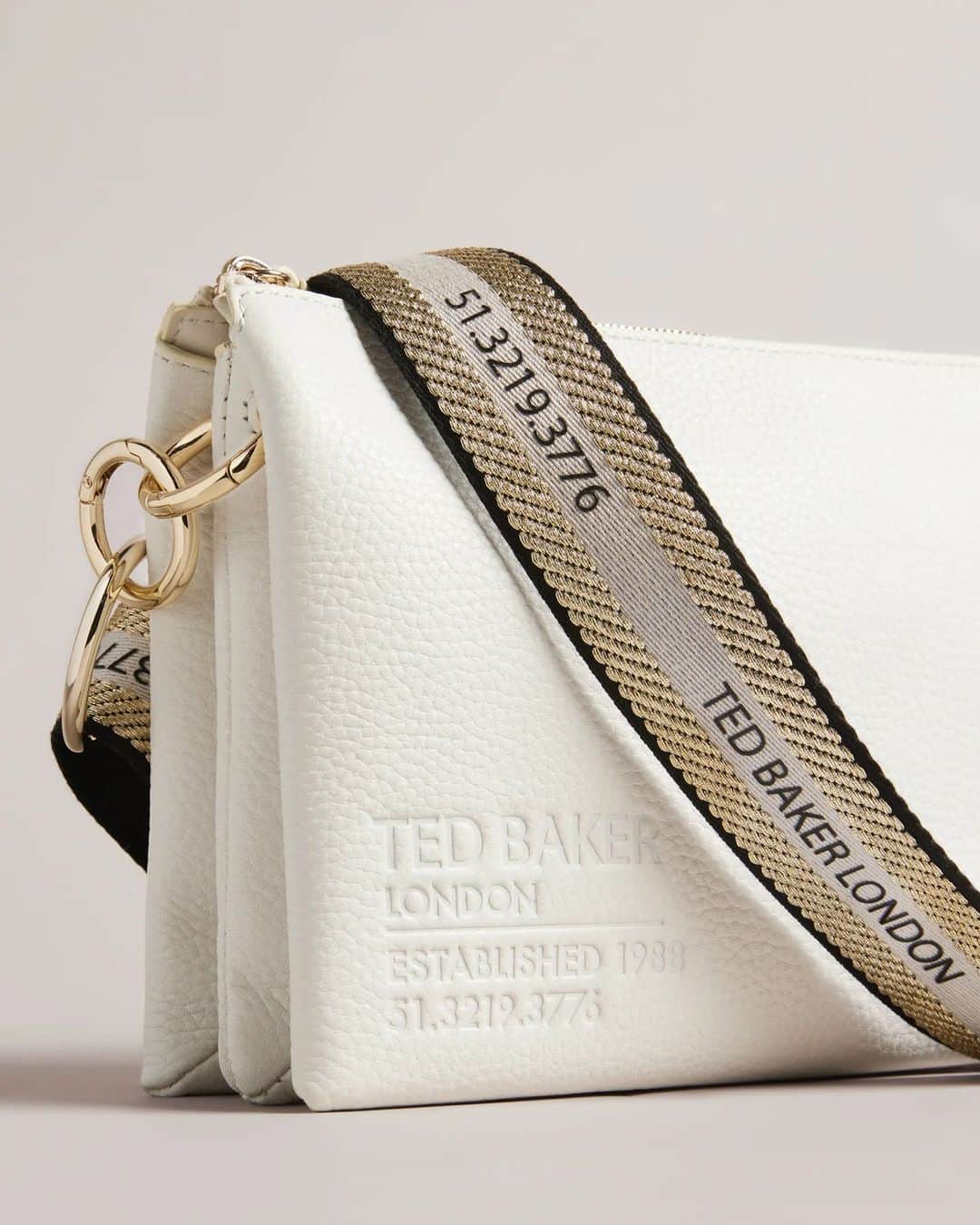 Ted Bakerのインスタグラム：「Our webbing crossbody bag is always ready for a close up. #TedBaker #ItsAShoreThing」