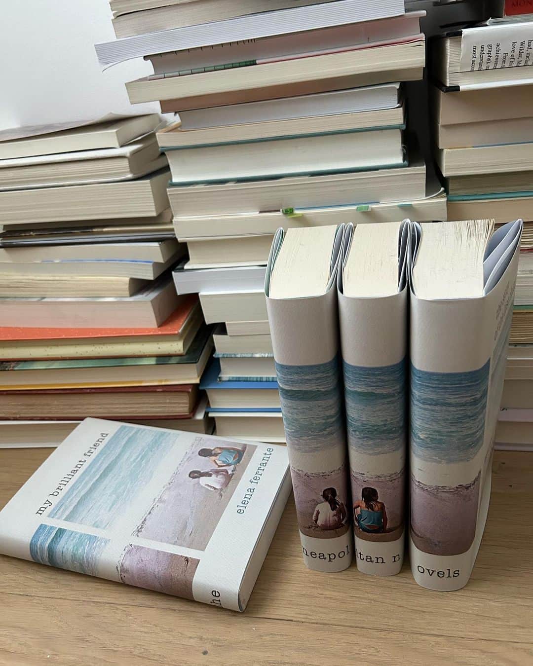 ベス・ベアーズのインスタグラム：「There's nothing more "late summer" to me than #elenaferrante and stacks of well loved, well read and to be read books📚  #bookstagram #book #bookworm #booklover #booknerd #bookaddict #bookphotography」