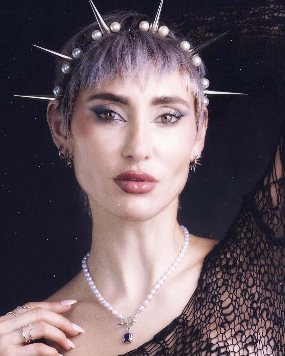 のインスタグラム：「Inspired by the alluring spines of the mysterious sea urchin, two rows of gleaming spikes hug your earlobes and beautifully frame the face.  Measuring 1" in diameter; these bold hoops were hand-carved in wax by Lily Streeter before being cast in solid sterling silver and hand-polished to a mirror-finish. Like their namesake, the Urchin Hoops are delicate yet dangerous, adding just the right amount of edge to any look…  {Shop link in stories}  Big Thanks to @milahardware for modeling for us! She created this incredible custom headpieces - Check out her page for leather, spikes and plenty more 😈」