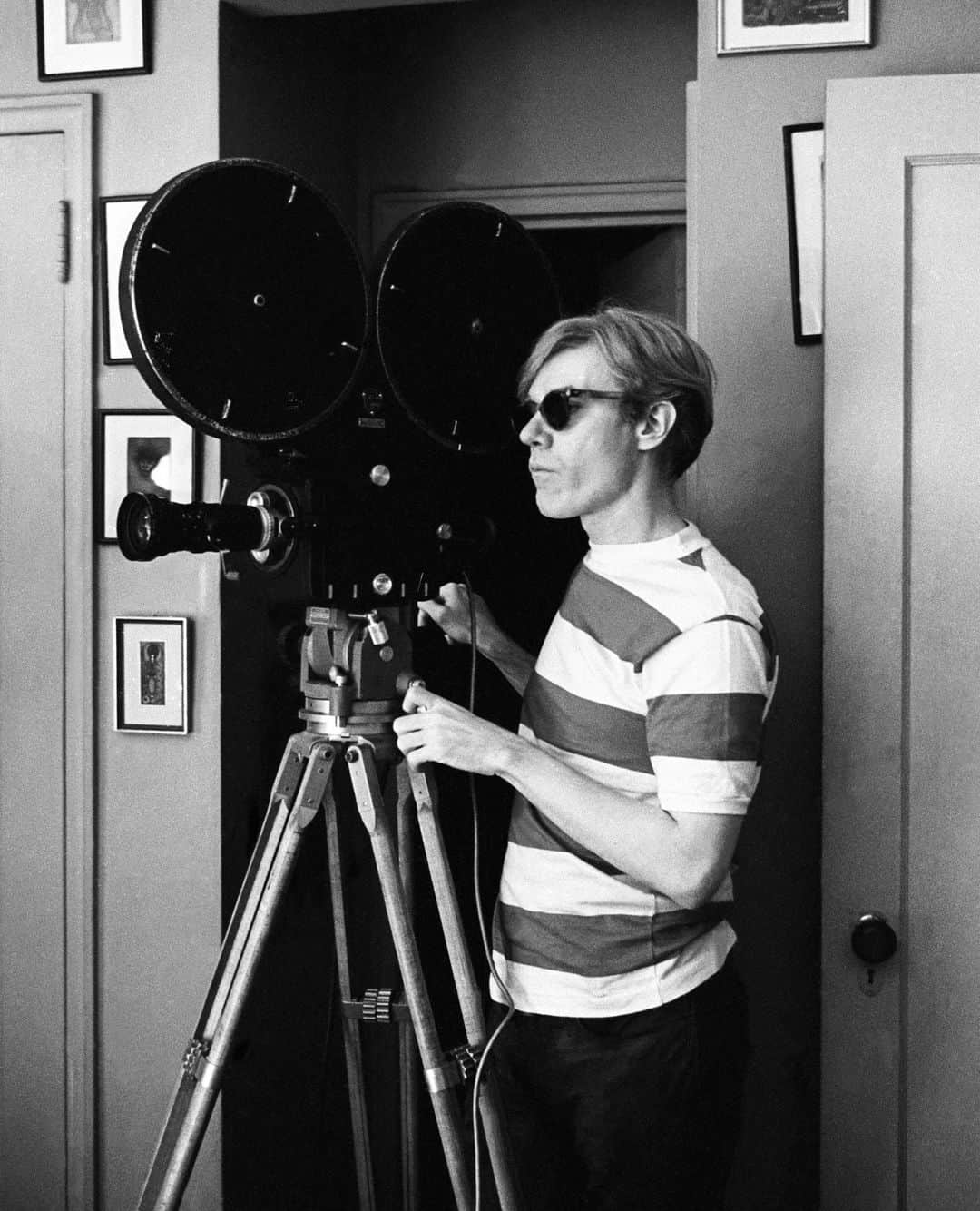 AnOther Magazineのインスタグラム：「Today would have been Andy Warhol's 95th birthday 🎈⁠ ⁠ An exhibition dedicated to Warhol is on show now in Provence, which traces the "tasty" history of the iconic pop artist. “You can trace Warhol’s influence through the vast majority of leading contemporary artists today,” the show's curator told AnOther. Part of the air that we breathe is Warhol.” Revisit the interview at the link in bio 📲⁠ ⁠ 📸 Andy Warhol Filming The Chelsea Girls, 1966. Courtesy of Getty⁠」