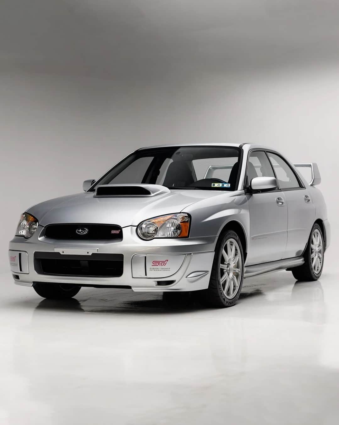 HYPEBEASTさんのインスタグラム写真 - (HYPEBEASTInstagram)「@hypedrive: @bringatrailer is selling a time machine example of the @subaru_usa WRX STI.⁠ ⁠ While you may be asking 'so what?,' to find a 2004 Subaru STI Blobeye in this condition is just as rare of a find as a low-mileage Porsche, Alfa Romeo, JDM Skyline, etc. This specific STI has only 5k miles on the clock, and is in its original Platinum Silver Metallic paint matched with iconic factory Gold brakes and 17" BBS wheels. Naturally, the 2.5L turbo boxer is intact, and a recent timing belt service has been done in 2021 to maintain its condition. Even the interior is in great condition, blue Recaros and all.⁠ ⁠ It's obvious that the market respects the extremely low mileage, excellent condition Blobeye STI, as the price is already $37,969 USD – they retailed for $30,995 USD 19 years ago for reference – with five days remaining on the auction.⁠ Photos: @iamted7/Bring a Trailer」8月7日 19時00分 - hypebeast