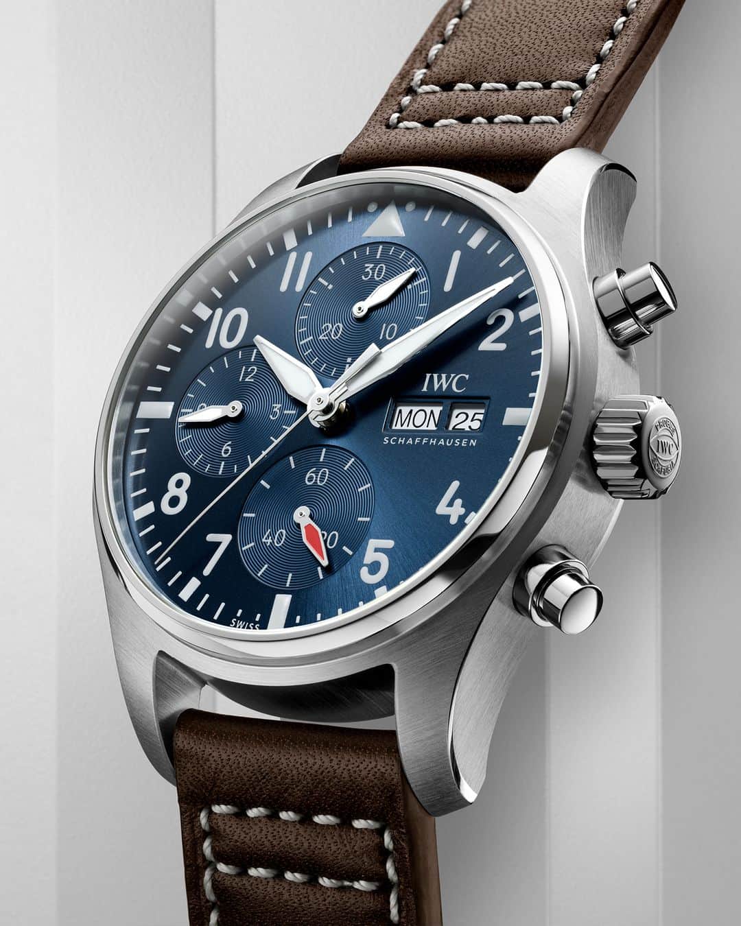 IWCのインスタグラム：「The perfect blend of form and function. The Pilot's Watch Chronograph 41 features a captivating blue dial with sunray finish and a technically enhanced and reliable chronograph function, powered by the self-winding 69385 calibre movement.  #IWCpilot | #TheReference  🔗Link in Bio  ℹ Blue dial Stainless steel case 41mm IWC-manufactured 69385 Calibre Ref. IW388101 paired with a brown calfskin strap.   📍 Visit your IWC boutique or retailer to discover the variety of strap options available.」