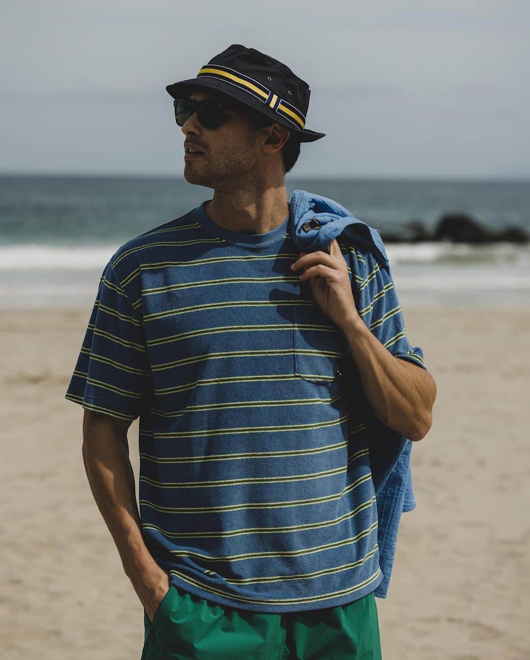 BEAMS+さんのインスタグラム写真 - (BEAMS+Instagram)「... Hope you love the laid-back vibe of BEAMS PLUS classic beachwear! ---------- ●Pocket Tee Pile Stripe A comfy T-shirt with a cool striped design, perfect for the beach. It's made from a mix of cotton and polyester for a soft feel.  ●Pocket Tee Jacquard Stripe This tee draws inspiration from vintage styles and features a unique jacquard stripe pattern created with special yarn.  ●B.D. Double Gauze Enjoy the breezy and soft feel of this gauze material, which has a lovely textured finish.  ●MIL 1 Pleat Athletic Shorts These shorts are designed with a touch of vintage charm, made from smooth nylon taffeta, and inspired by U.S. Navy swim shorts.  快適な着心地と洗練されたスタイル、BEAMS PLUSのクラシックなビーチウェア。 ---------- ● Pocket Tee Pile Stripe 海が似合うパイル素材とストライプ。コットンとポリエステルの混紡生地を使用。パイル地のループ長を短く設定し、パイル特有の重みを軽減。肌触りと着心地を考えたパイルTシャツ。  ● Pocket Tee Jacquard Stripe ビンテージ Tシャツから着想し、オリジナルで編み立てたジャカードストライプ。40番双糸を使い、4色の先染め糸で編みあげています。  ● B.D. Double Gauze 柔らかで通気性に富むガーゼ素材。生地染めを行うことでふっくらとした風合いに仕上げています。   ● MIL 1 Pleat Athletic Shorts 50デニールナイロンタフタを使用。ヴィンテージ感のある微光沢のナイロンは、もちろんオリジナルファブリック。 U.S.NAVYのスイムショーツをベースにデザインしたモデルです。 . @beams_plus @beams_plus_harajuku @beams_plus_yurakucho #beamsplus」8月8日 20時03分 - beams_plus_harajuku