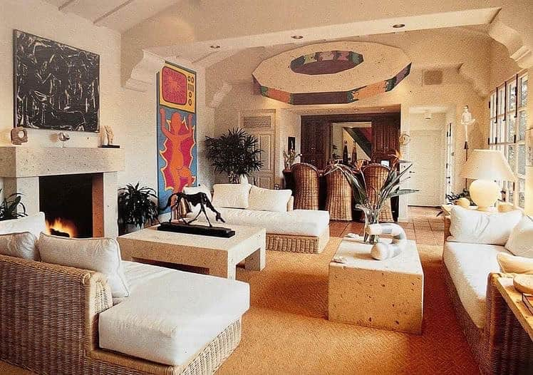 Meganのインスタグラム：「Via 〰️ @charlesgmagne a room with all the good things - rattan furniture  and sensational art collection ⚡️  Frederick R. Weisman’s salon de musique, Holmby Hills, Los Angeles. Above the mantle is #willemdekooning “Dark Pond”, (1948) and on the coffee table #albertogiacometti “Le Chien”, (1951), bronze. On the wall a #keithharing painting “Untitled”, (1984) and #rondavis “White Lid” (1969) . . . . #artcollector」