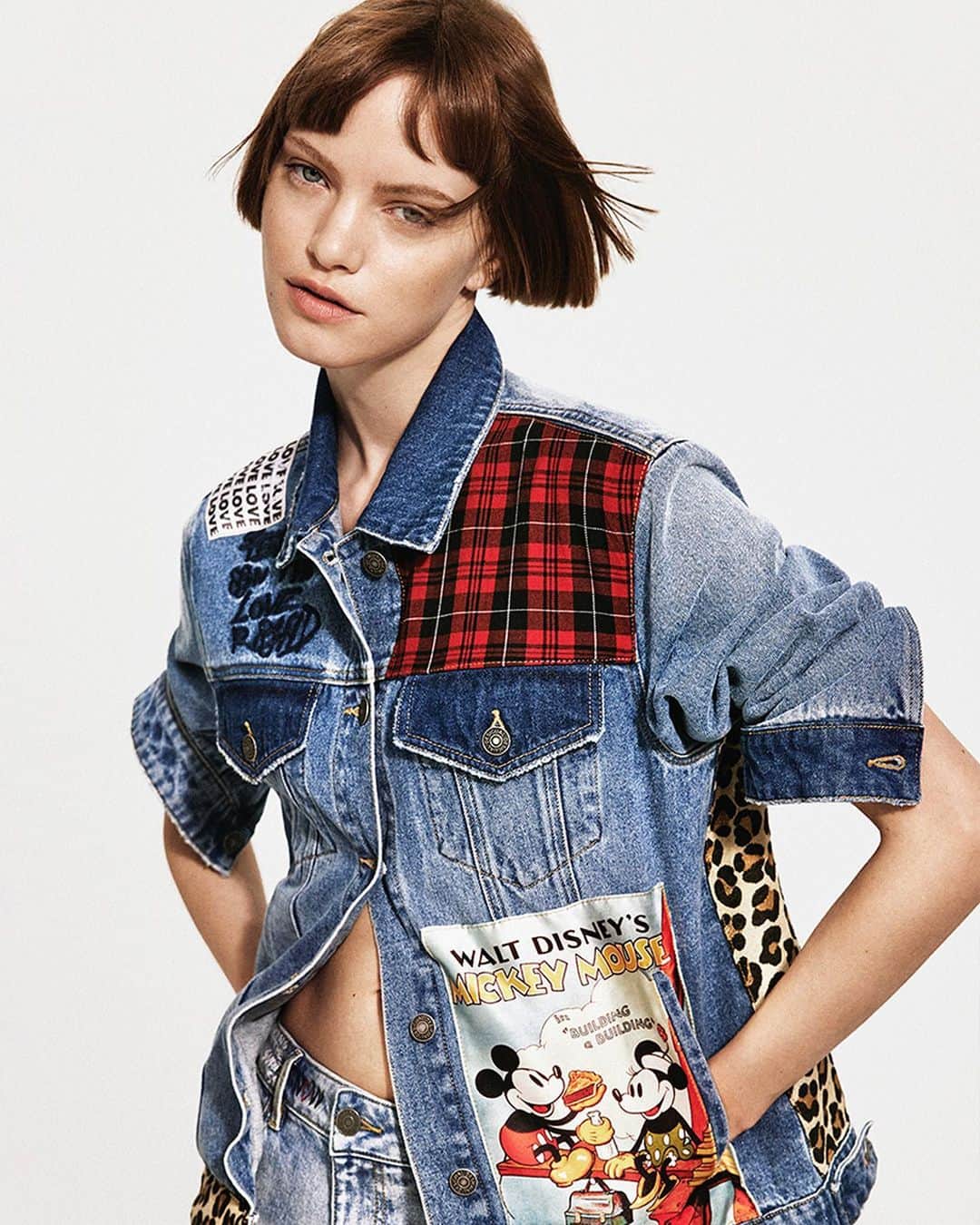 デシグアルのインスタグラム：「A denim trucker jacket with a patchwork of different fabrics, embroidered messages & prints. Disney's Mickey Mouse in every detail. ​  #DesigualAndDisney #NewDesigual​」